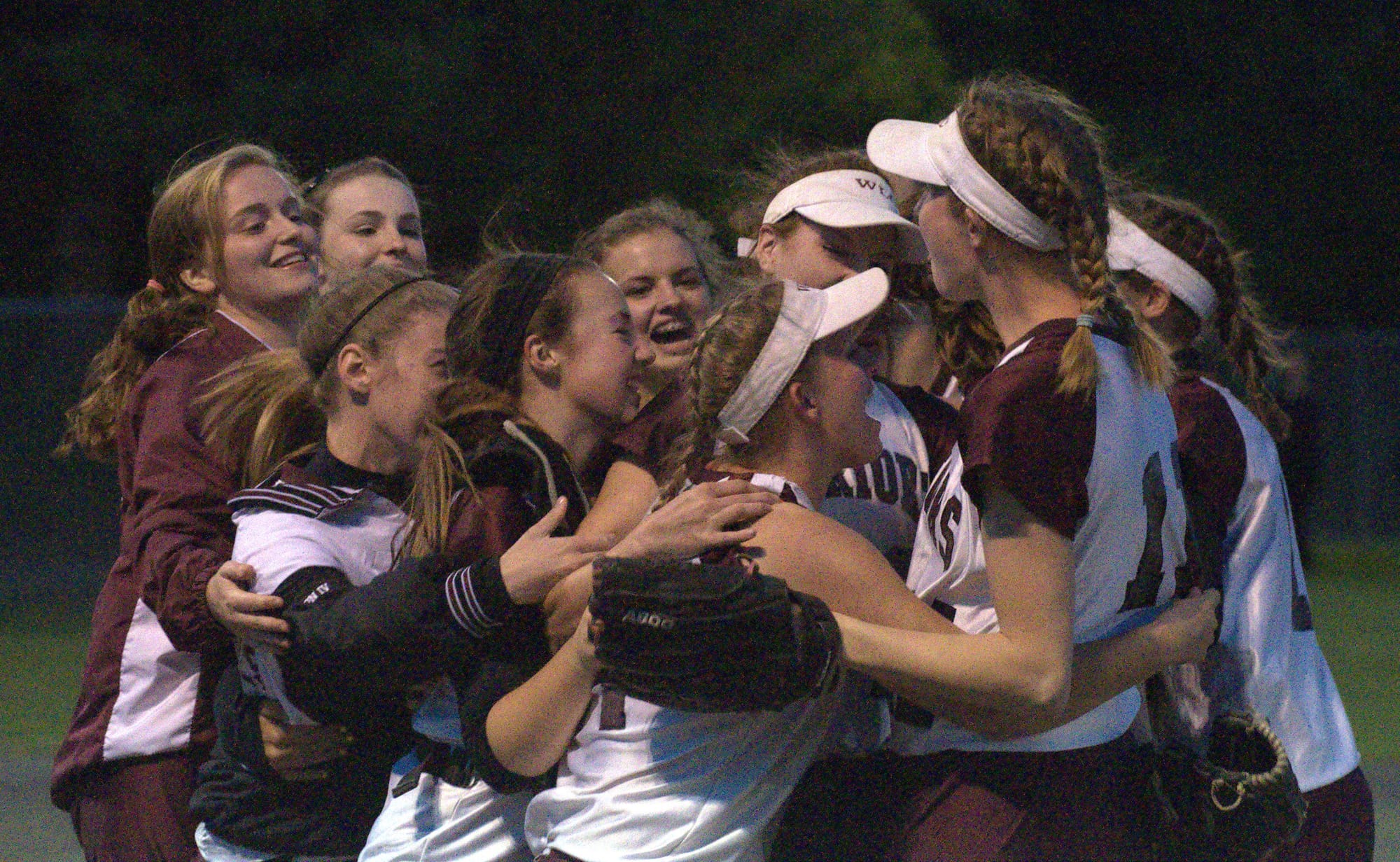 The Wilton-Lyndeborough softball team celebrate beating Profile in the Division IV semifinals.