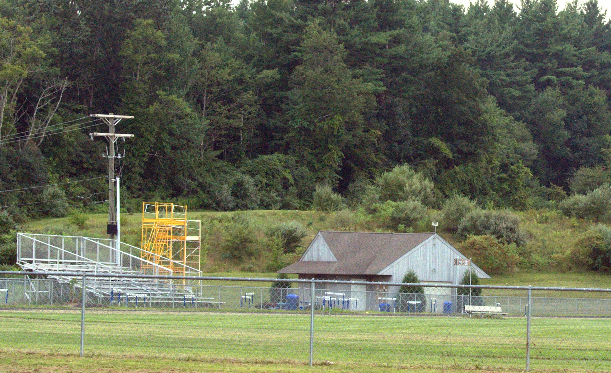 The home sideline at Coach Lou Korcoulis Field at Hollis Brookline High School.
