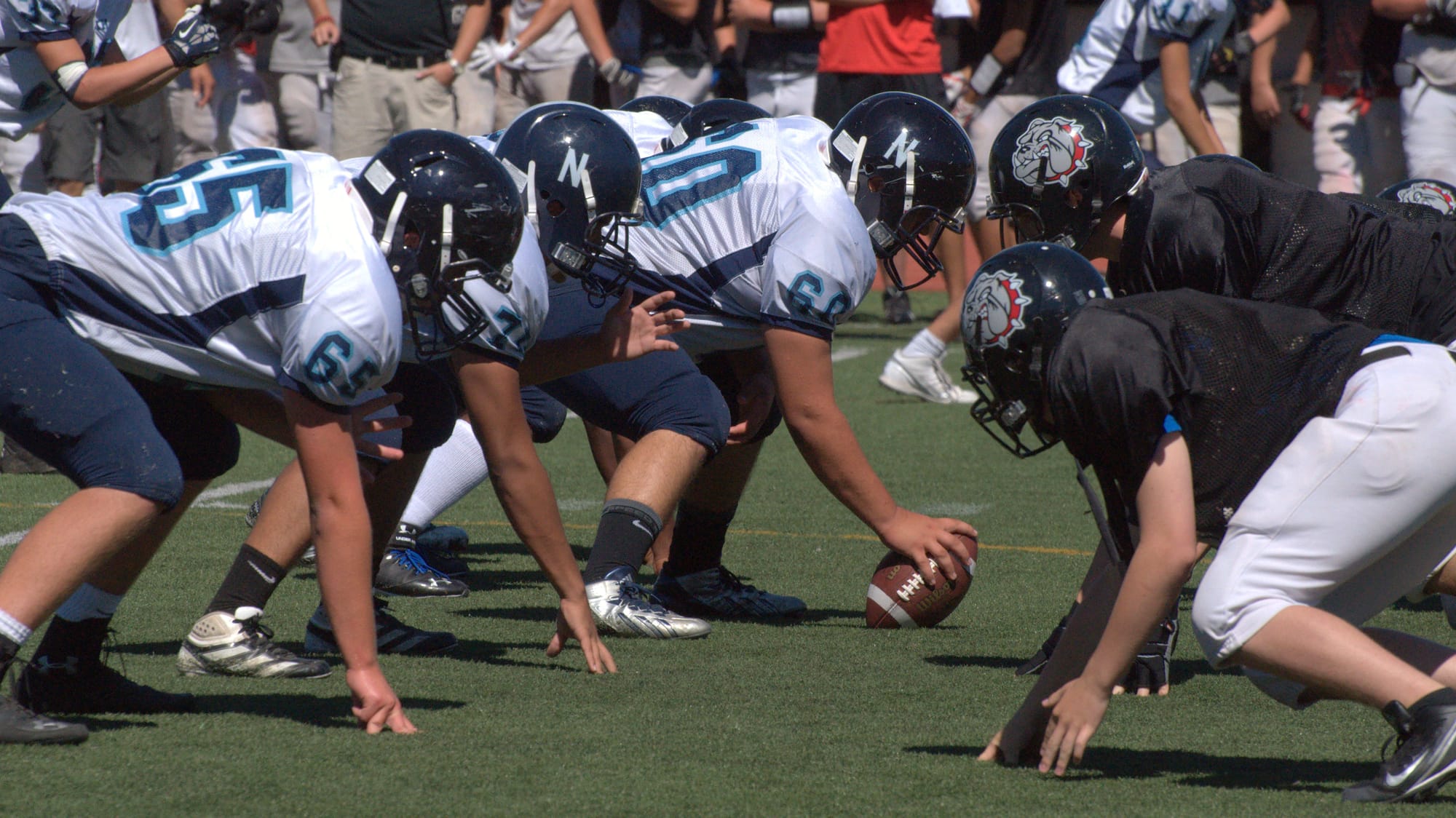 The Nashua North football team lines up for a play during Saturday's scrimmage at Bedford.