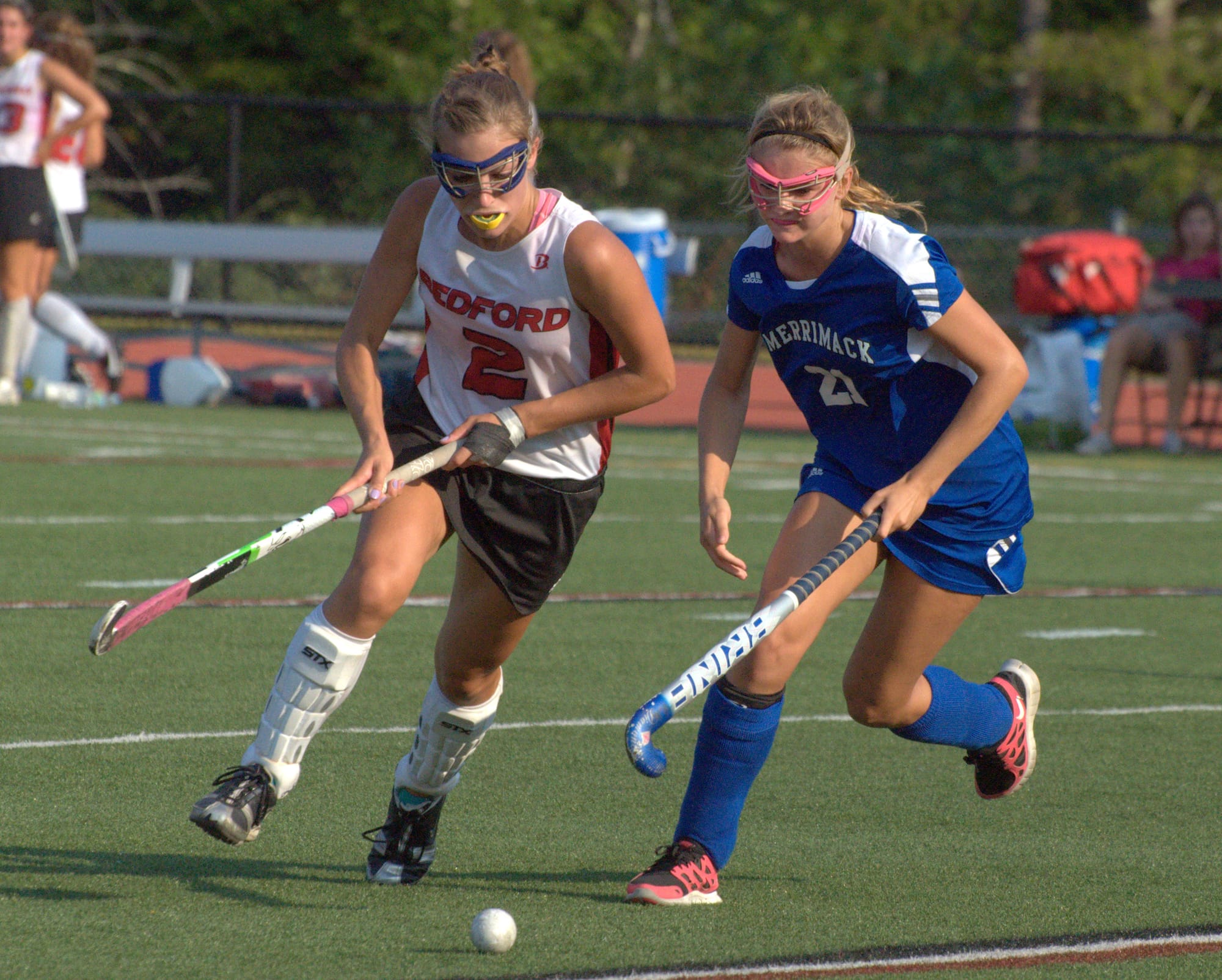 Bedford's Laura Costes and Merrimack's Cassie Smith chase after the ball during Wednesday's game. For more photos, go to the Photo Album.