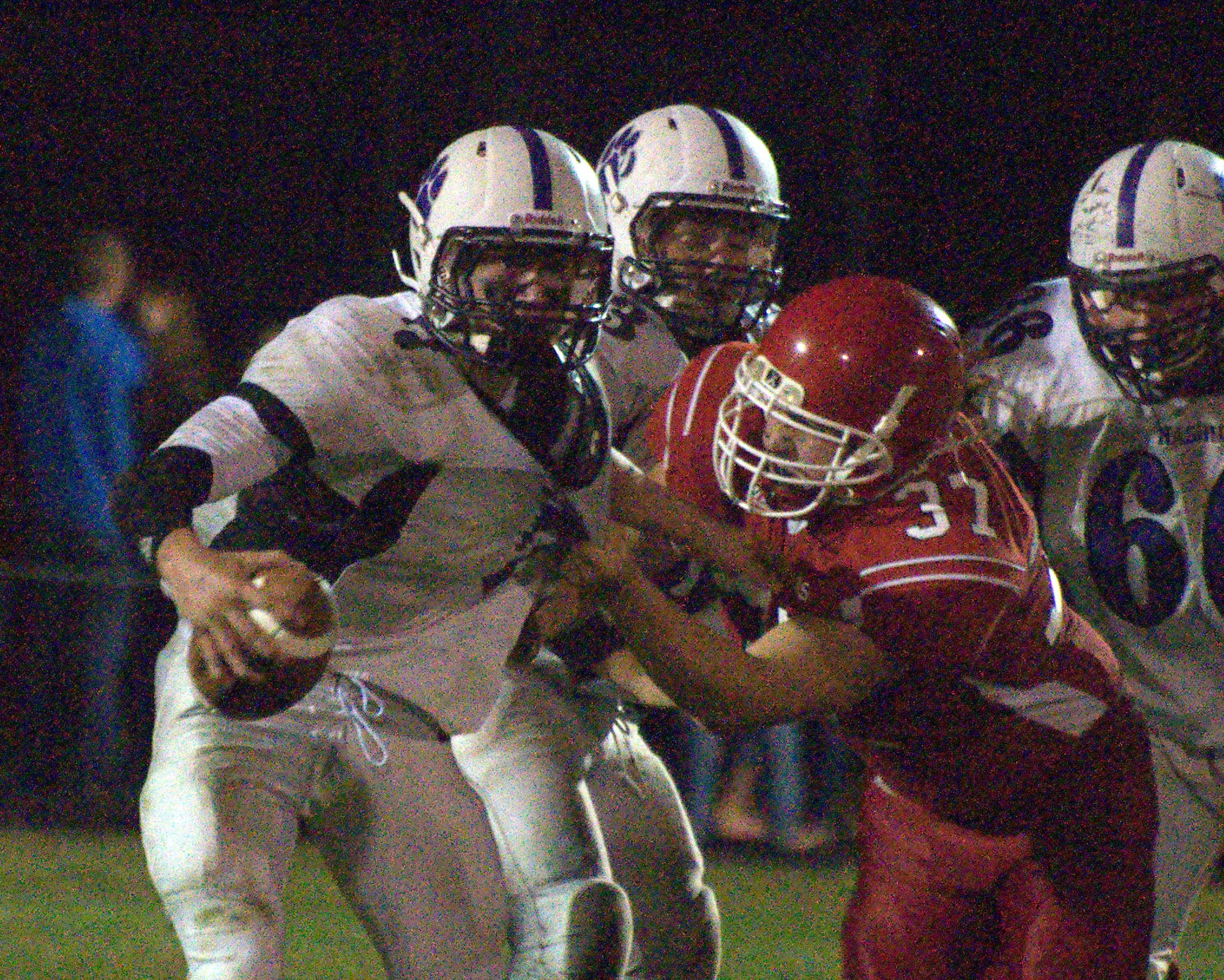 Nashua South's Trevor Knight tries to get away from Spaulding's Tanner Daniels during Friday's game.
