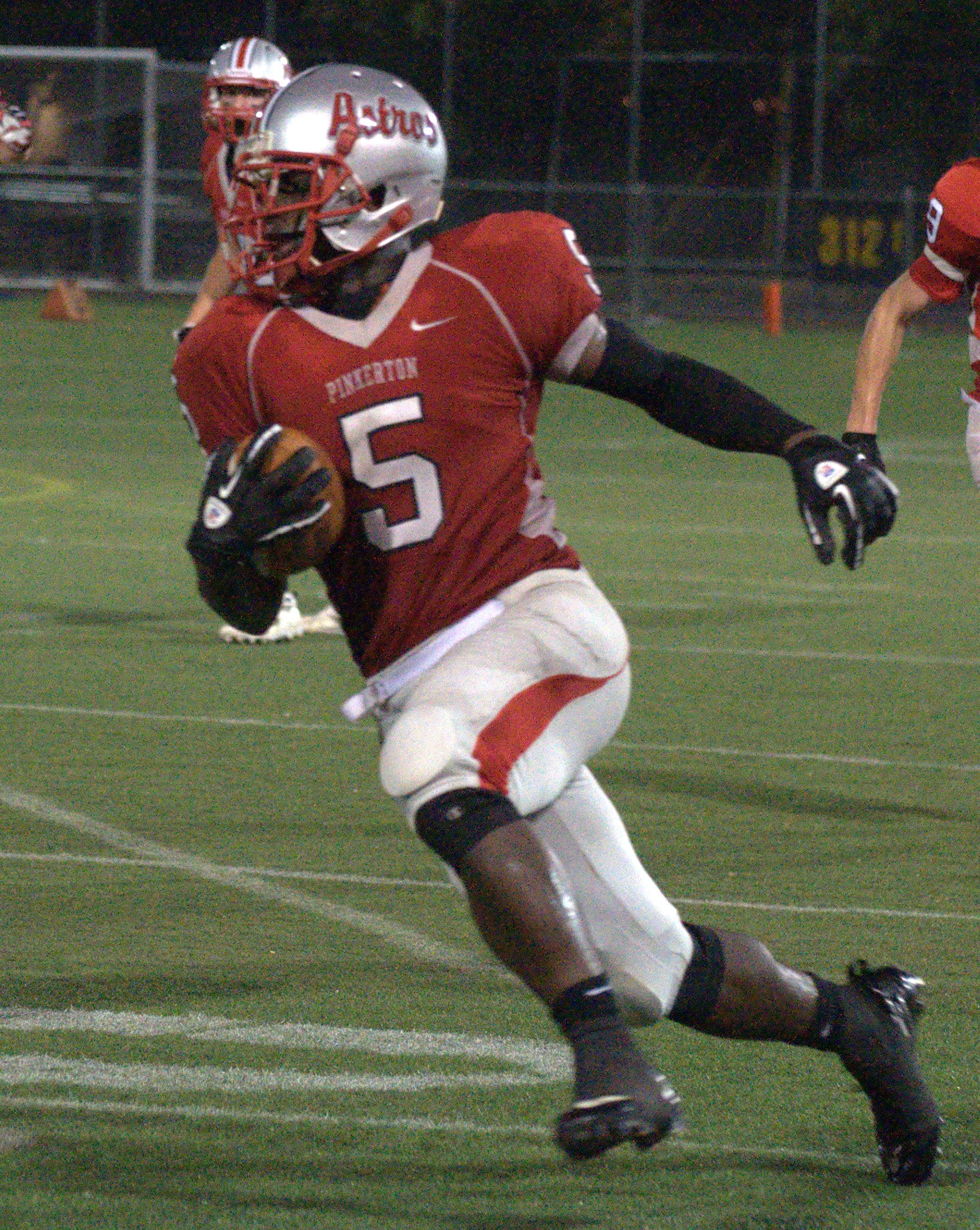 Pinkerton's Manny Latimore carries the ball during last Friday's scrimmage against Timberlane.