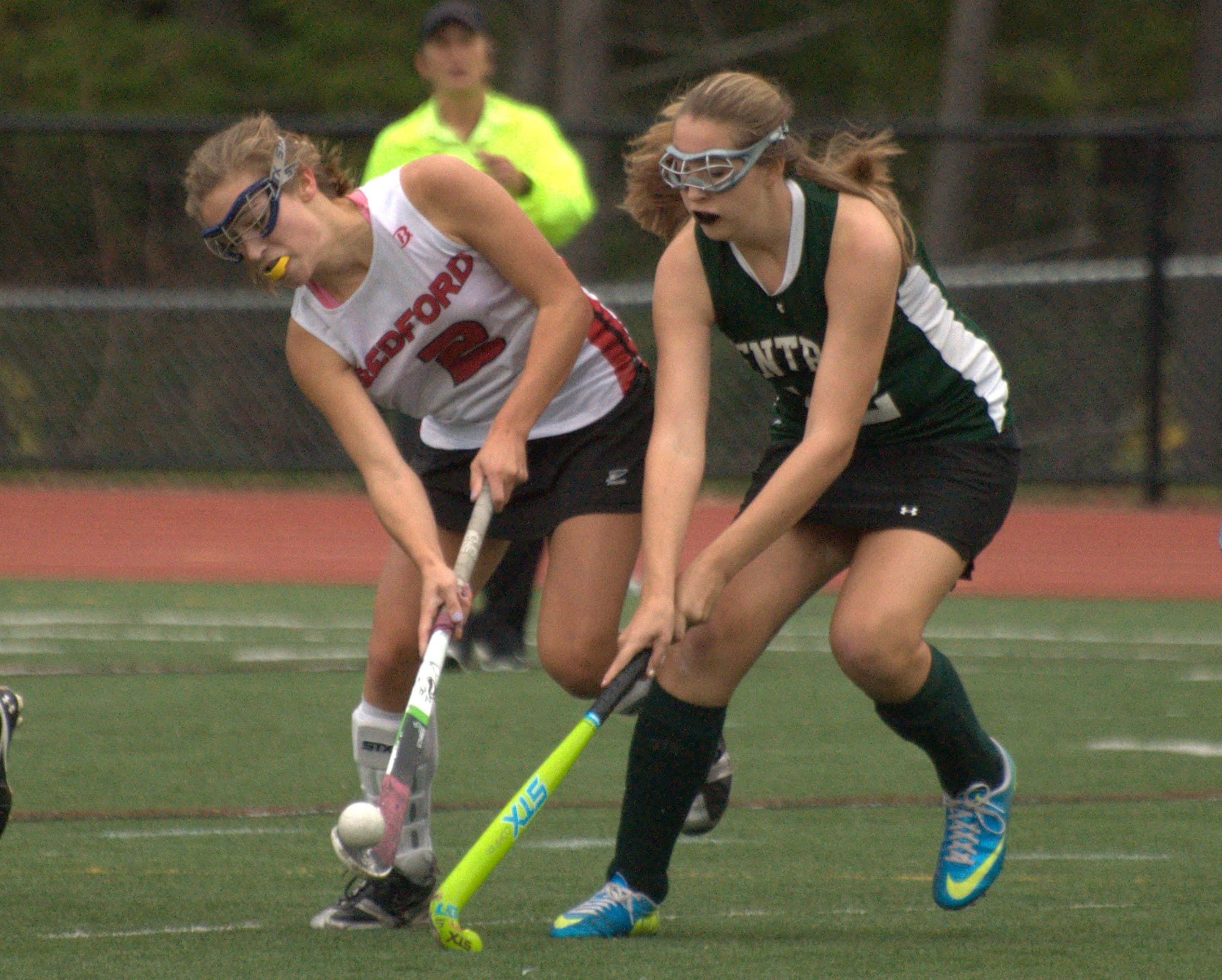 Bedford's Laura Costes and Manchester Central's Molly O'Connell go after the ball during Tuesday's playoff game.