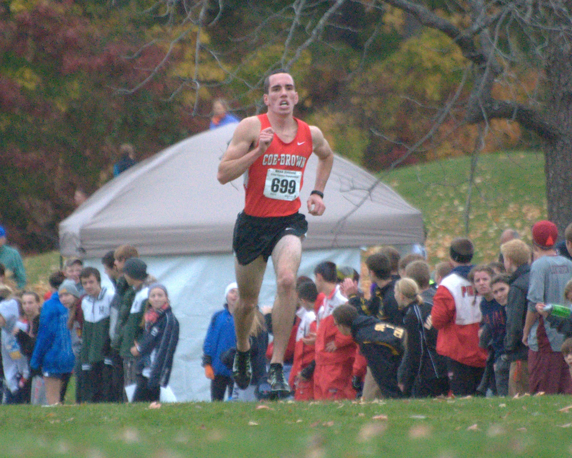 Coe-Brown's Jeremy Brassard heads for the finish line during Saturday's Division II boys cross country championship.