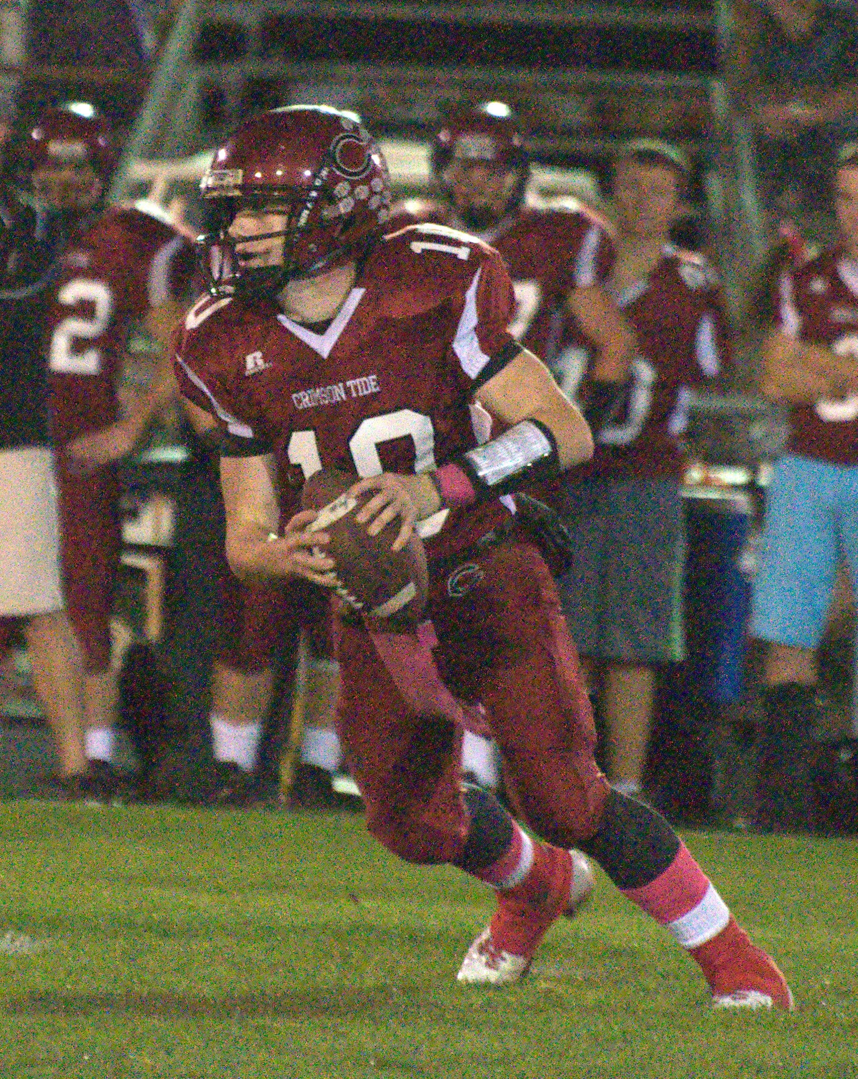 Concord's Robbie Law scrambles during Friday's game against Bedford.