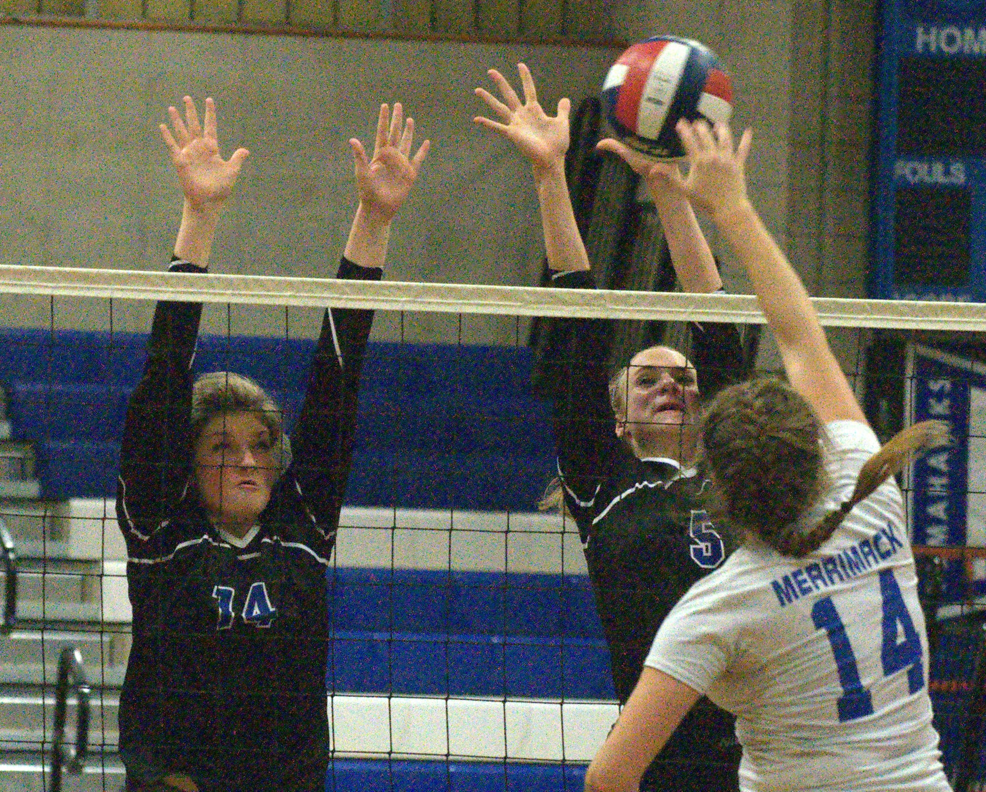 Kristin Johnson, left, and Sav Werne helped Hollis Brookline snap a seven-match losing streak with a win over Manchester Memorial on Wednesday.