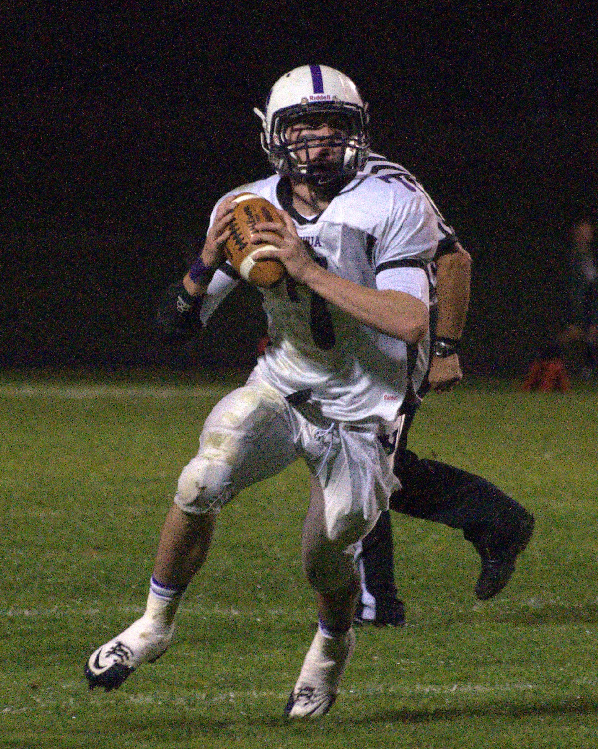 Nashua South's Trevor Knight looks for an open receiver during Friday's game against Dover.