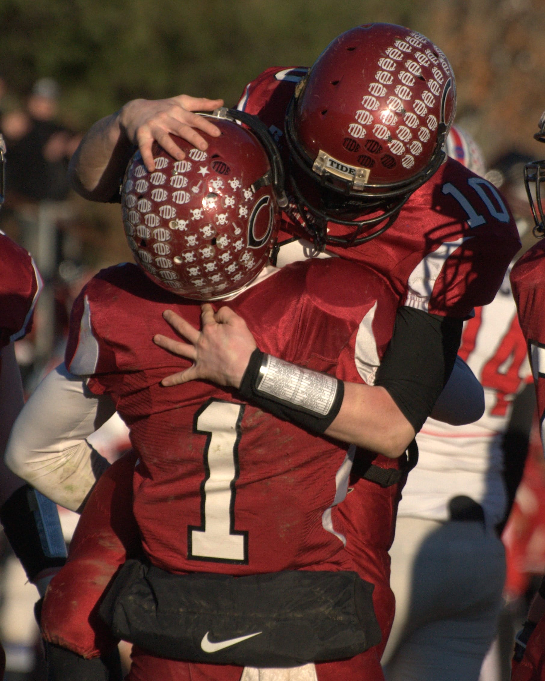 Concord's Robert Law celebrates with teammate Seimou Smith (No. 1) after the Crimson Tide defeated Pinkerton on Saturday.