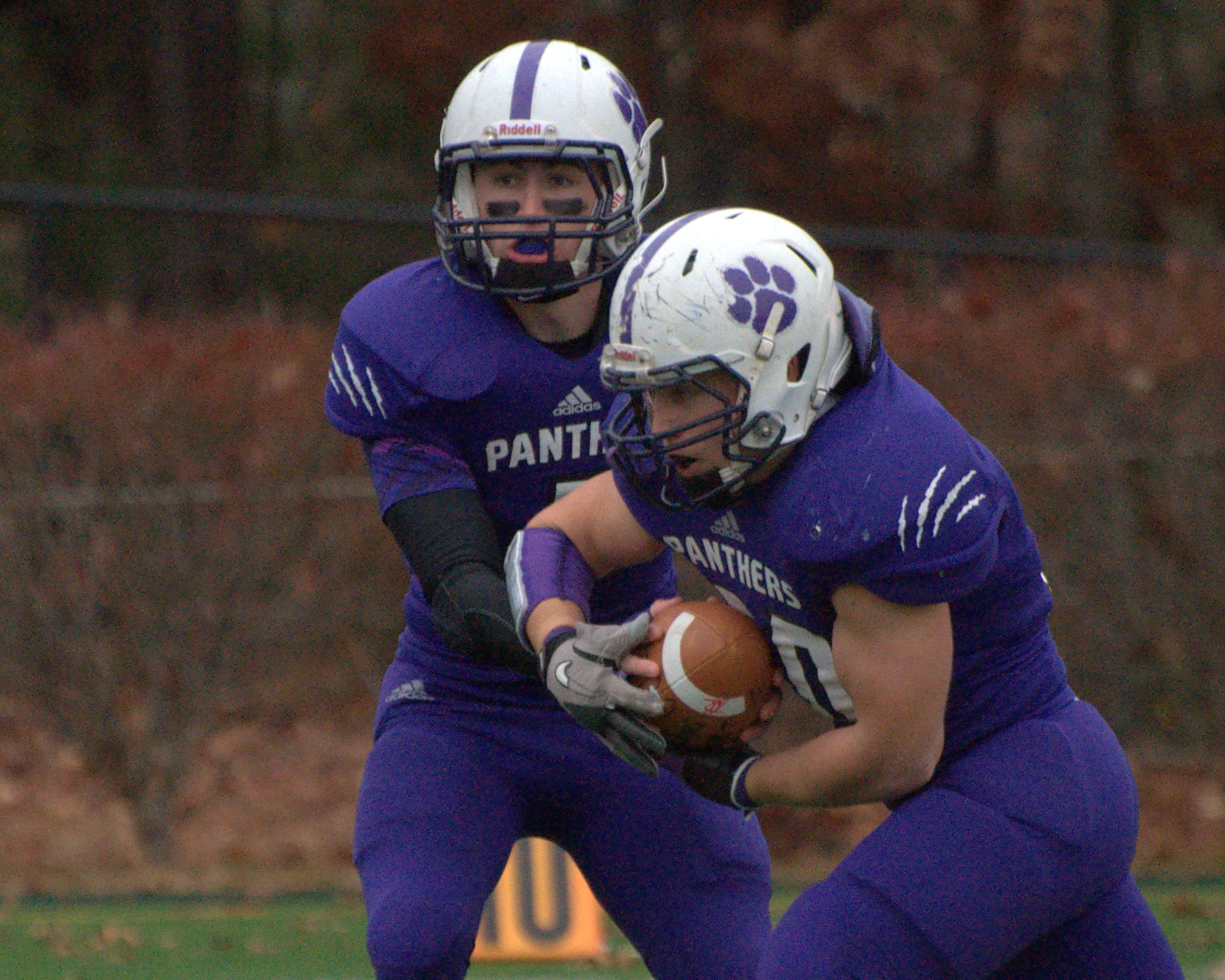 Nashua South's Andrew DeCarteret takes a handoff from Trevor Knight.