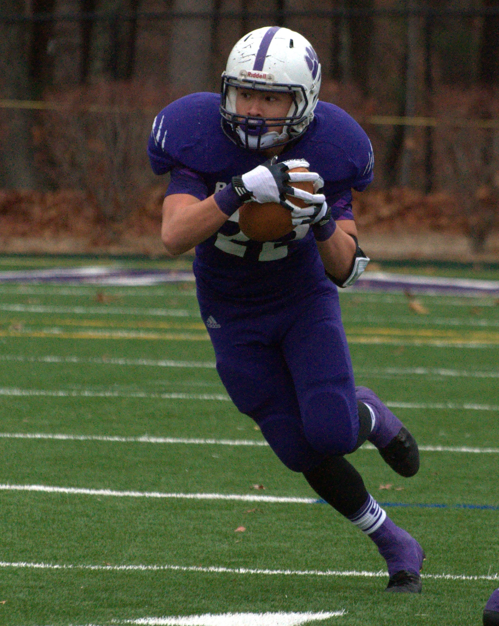 Nashua South's Josh Perry turns upfield after making a catch.