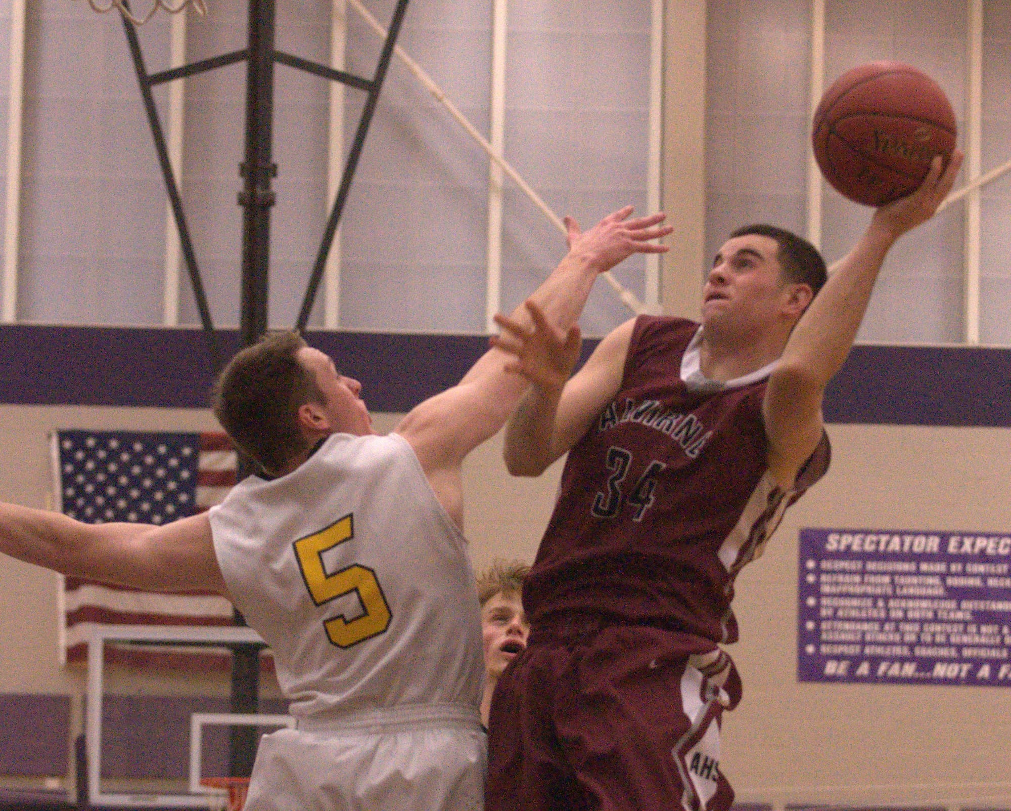Alvirne's Evan Hunt drives to the basket against Souhegan's Ben DeForest during Friday's game.