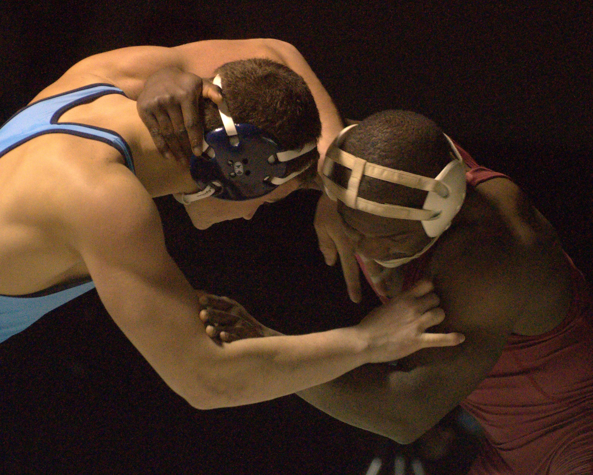 Nashua North's Joe Chimelski and Concord's Walters Ndi battle during the 195-pound match at Wednesday's dual meet.
