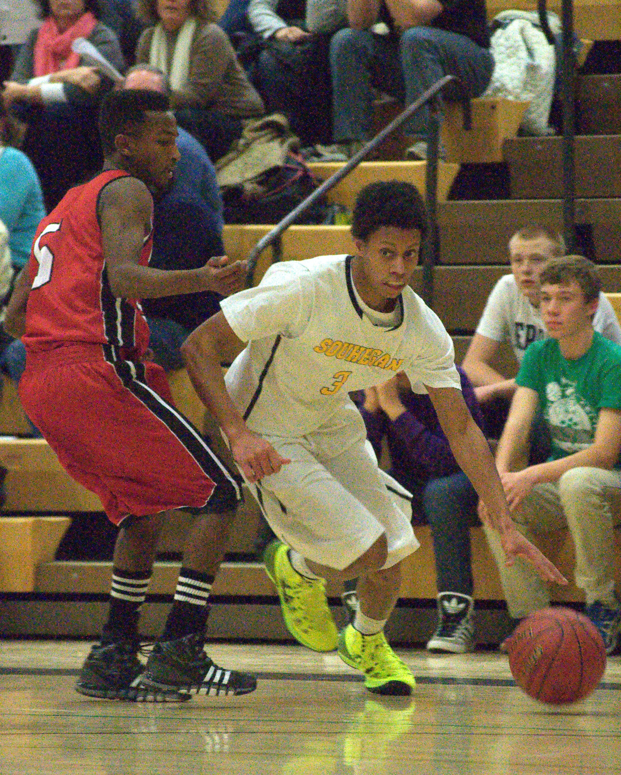 Souhegan's A.J. Hayes tries to get around Coe-Brown's Spencer Nowland.