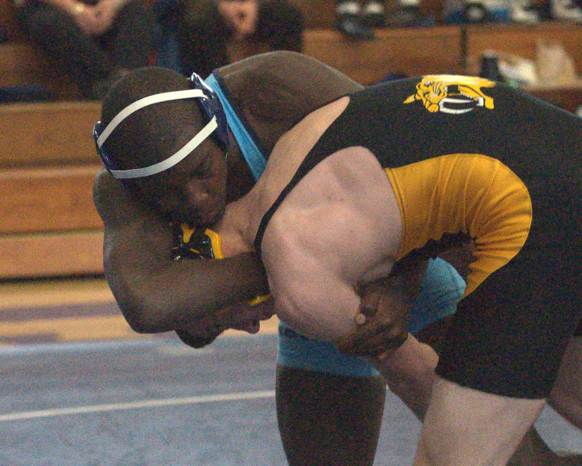 Nashua North's David Muite tries to bring down Souhegan's Lloyd Mosher during their 138-pound match at the Milford/Souhegan Tournament on Saturday.