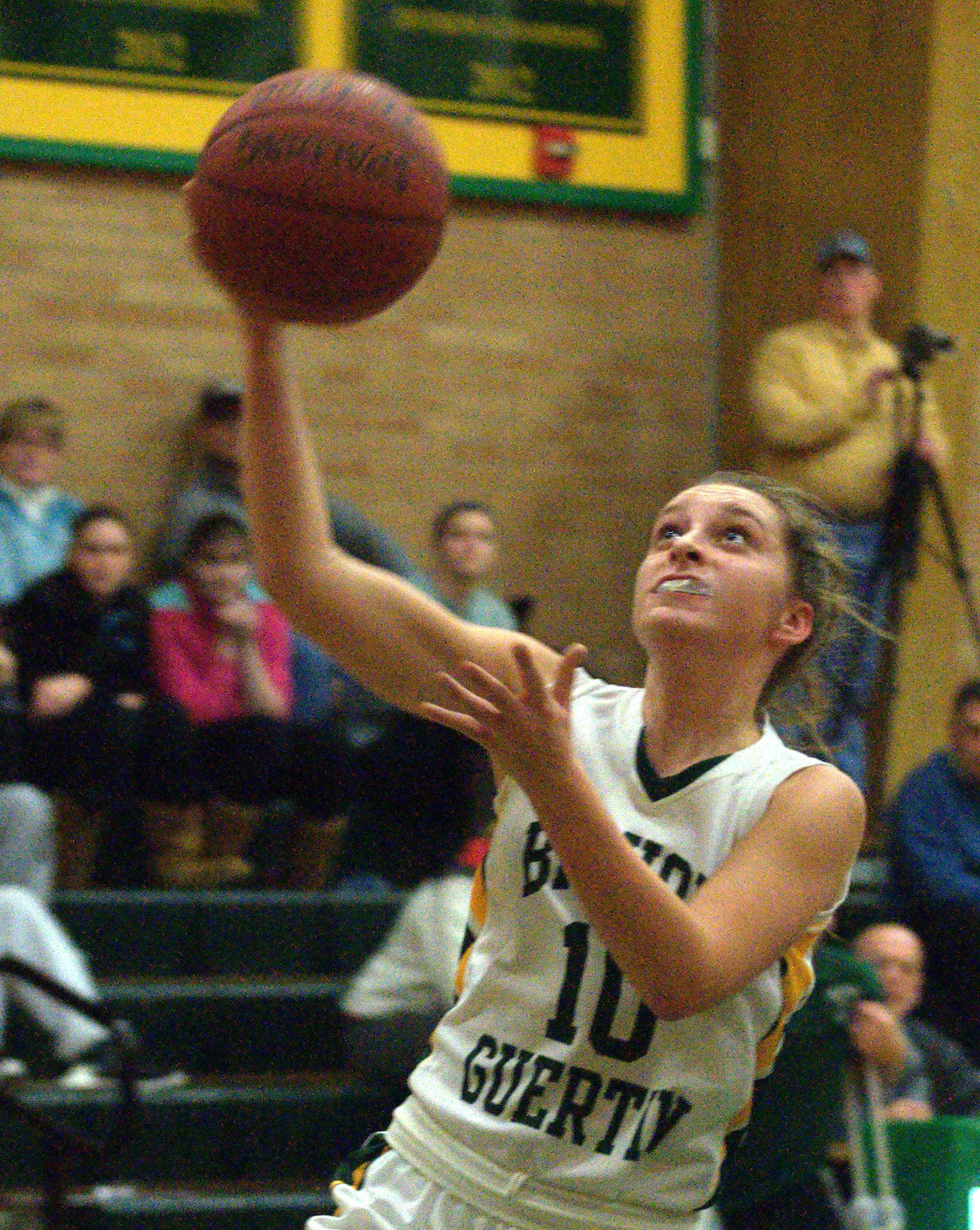 Bishop Guertin's Jamie Sherburne goes in for a layup.
