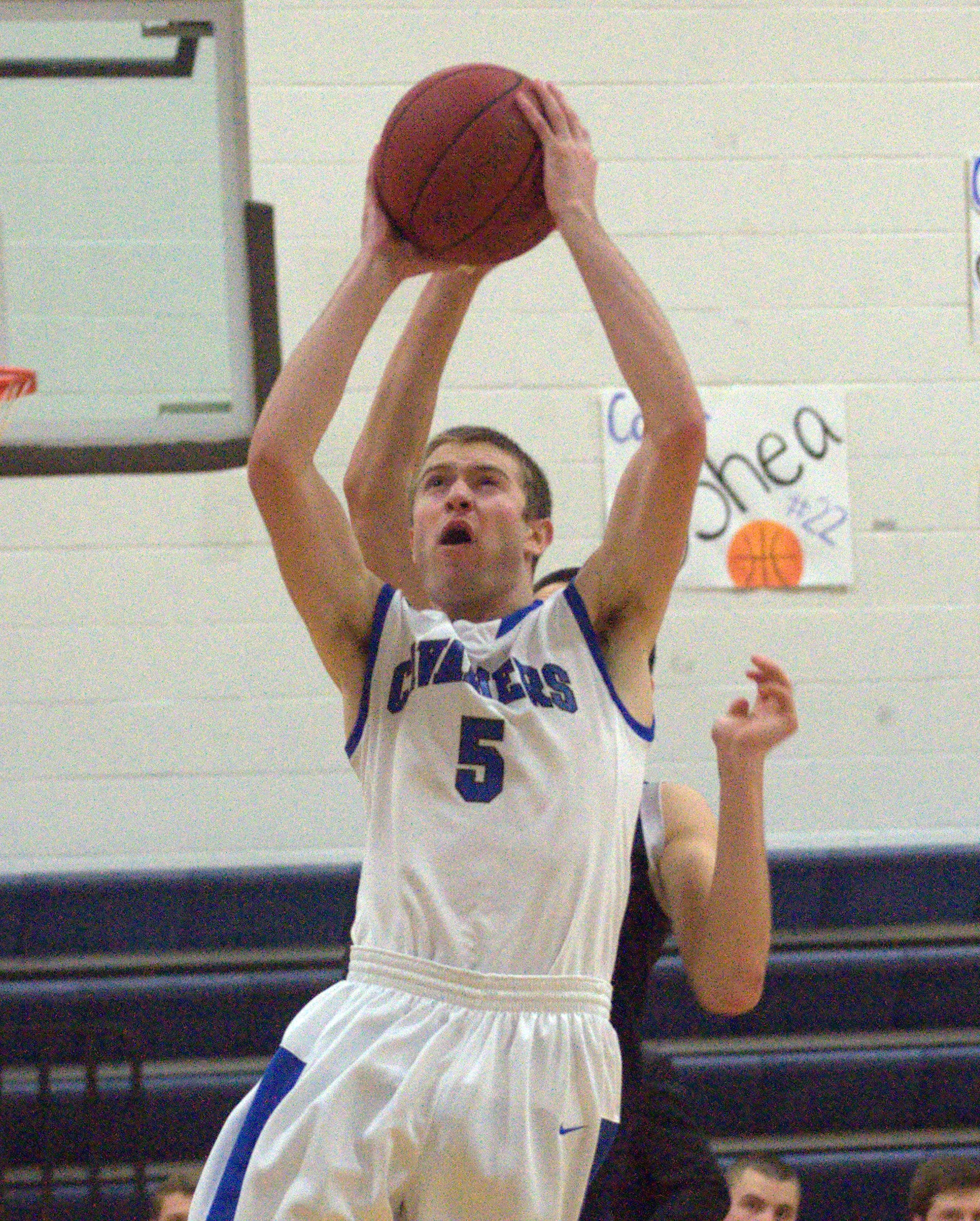 Hollis Brookline's Cole Gallant drives in for a layup during Tuesday's game.