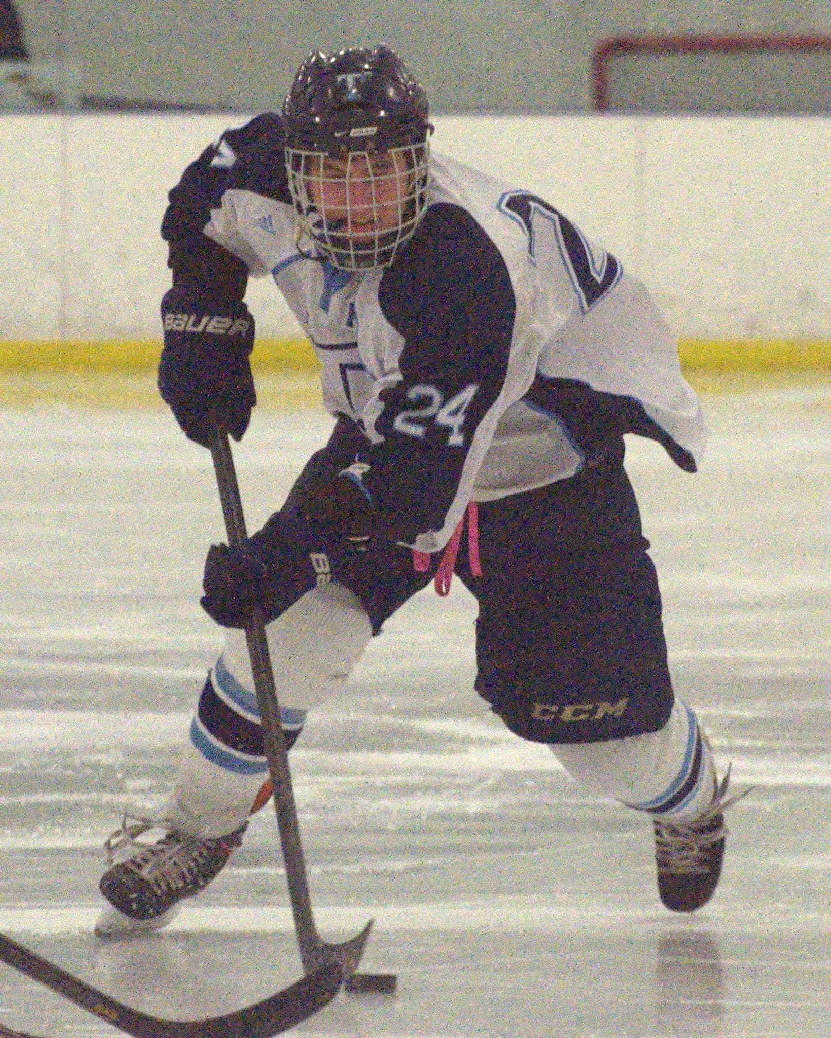 Nashua North's Jon Wilson brings the puck down the ice during Saturday's game against Hanover. For more photos, go to the Photo Album.