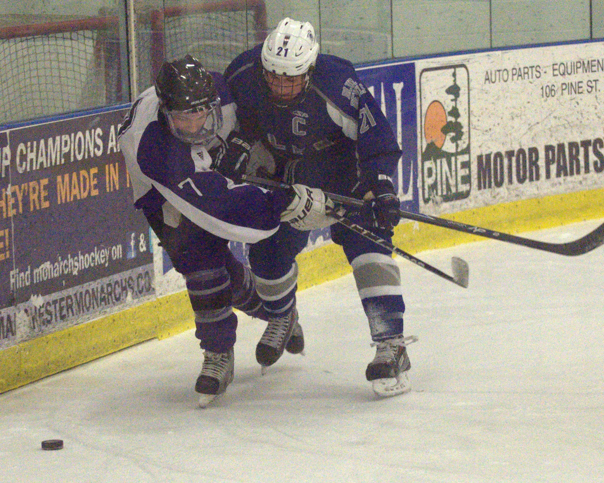 Salem's Brian Frazier tries to knock Nashua South's Owen McNulty off the puck during Monday's game.