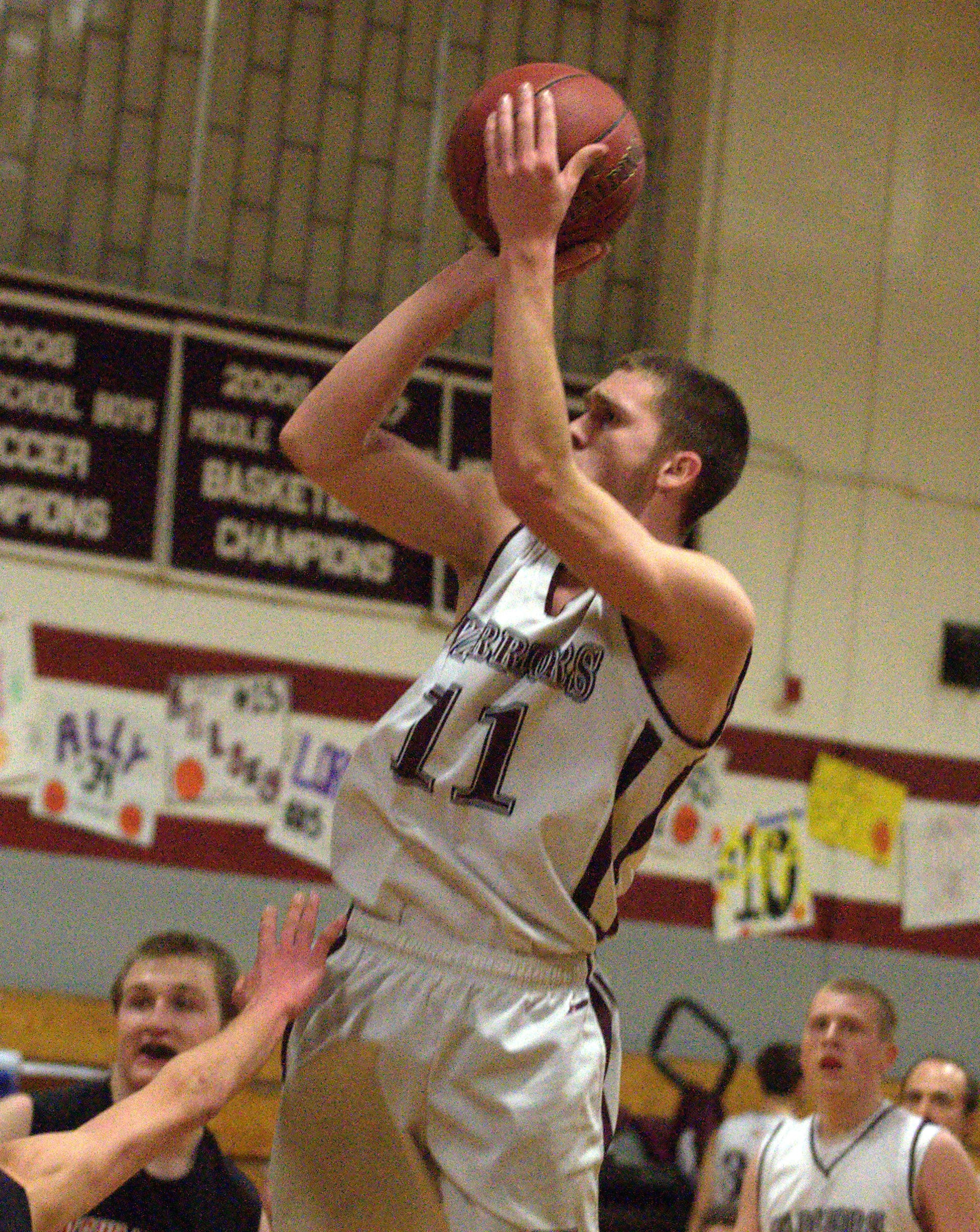 Wilton-Lyndeborough's Jordan Litts pulls up for a shot during Friday's game against Newmarket.