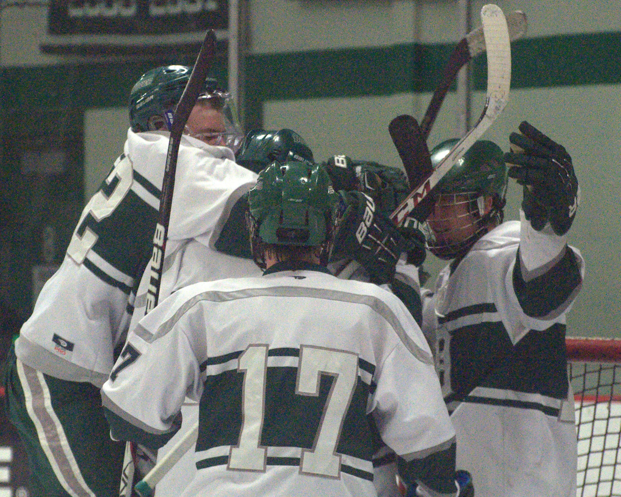 Dover players celebrate after Thursday's win over Spaulding.