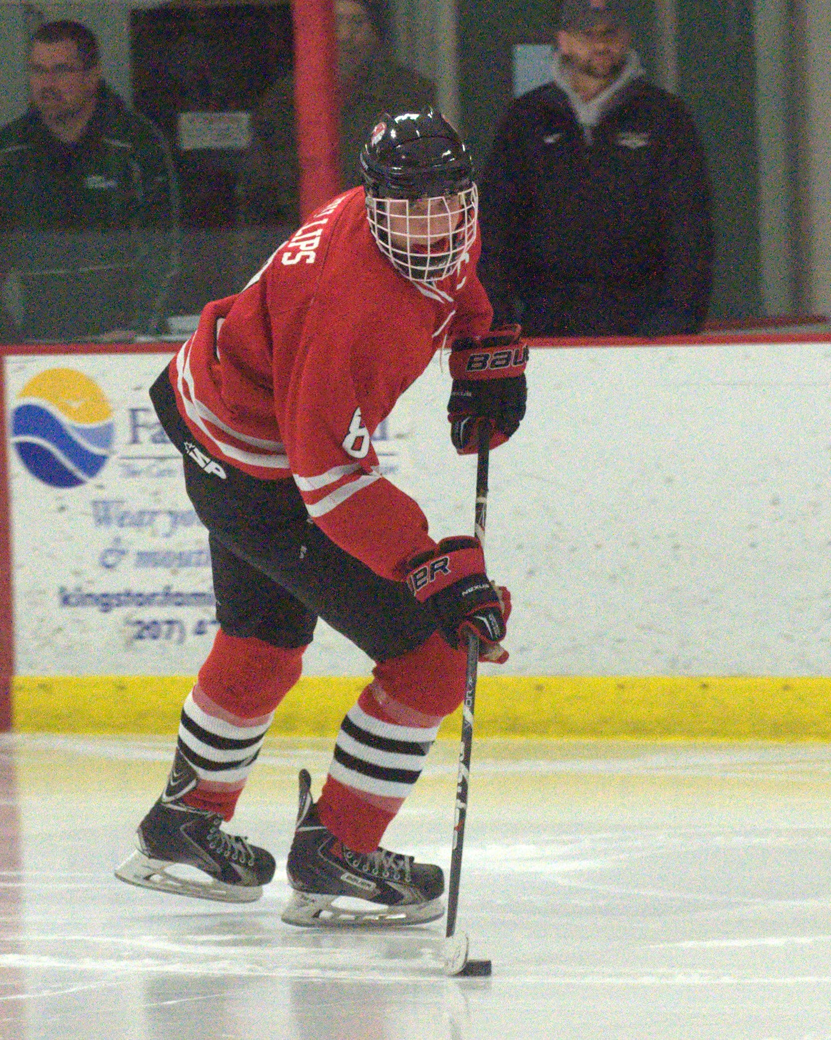 Spaulding's Brent Phillips skates with the puck during Thursday's game.