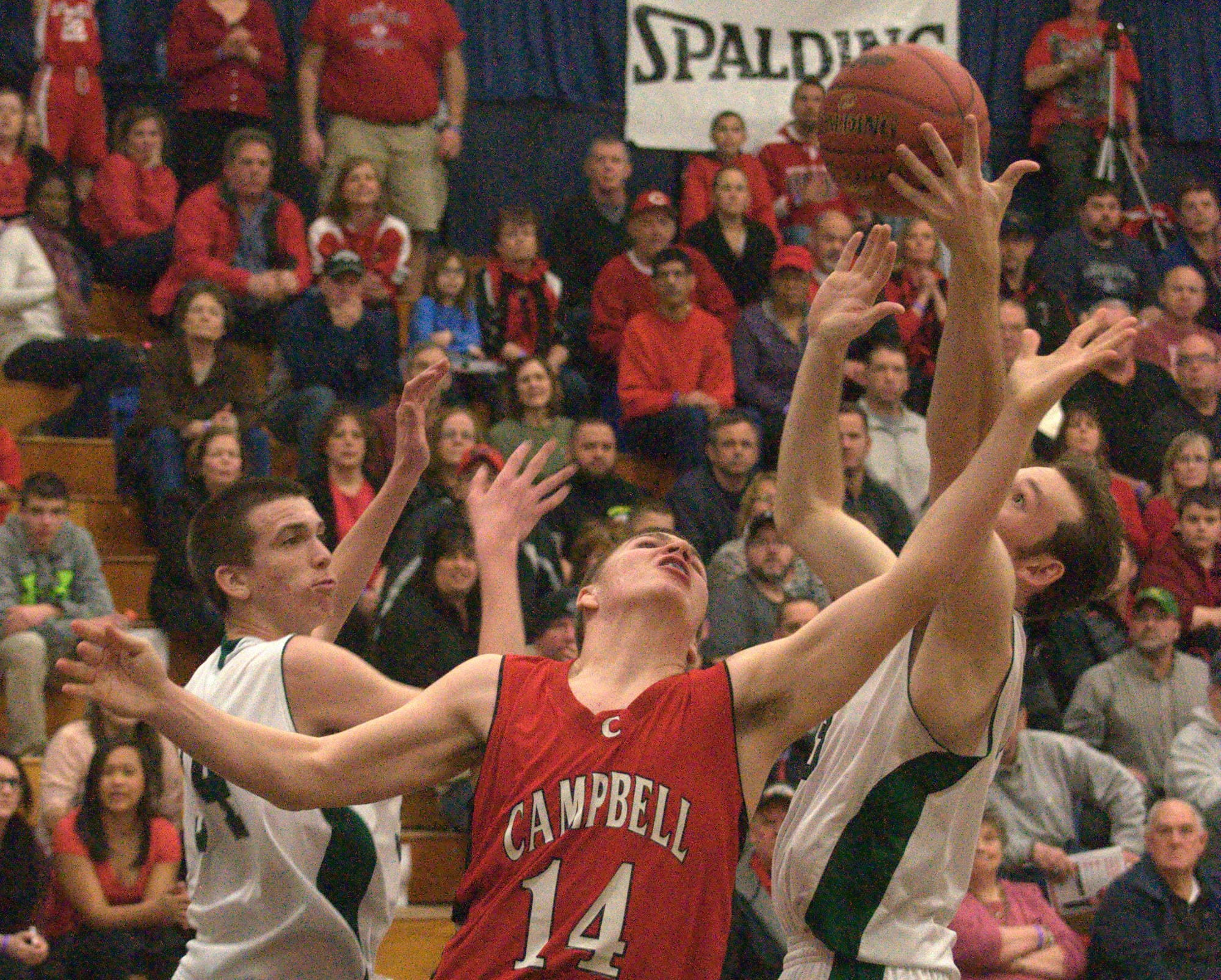 Campbell's Harrison Vedrani loses the ball after getting fouled during Friday's game.