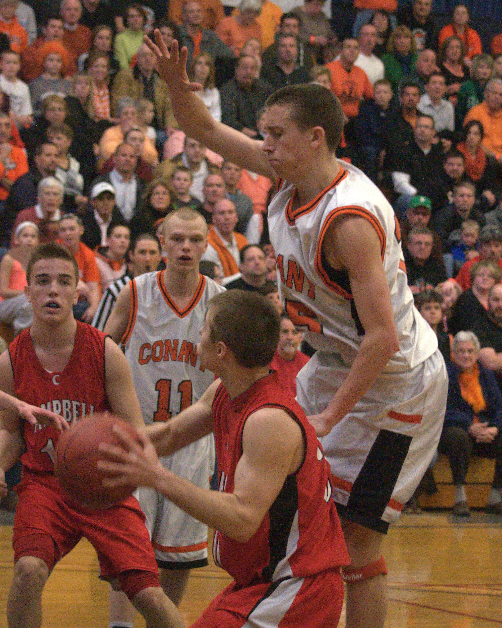 Conant's Robert O'Brien defends as Campbell's Kyle Shaw gets ready to shoot.