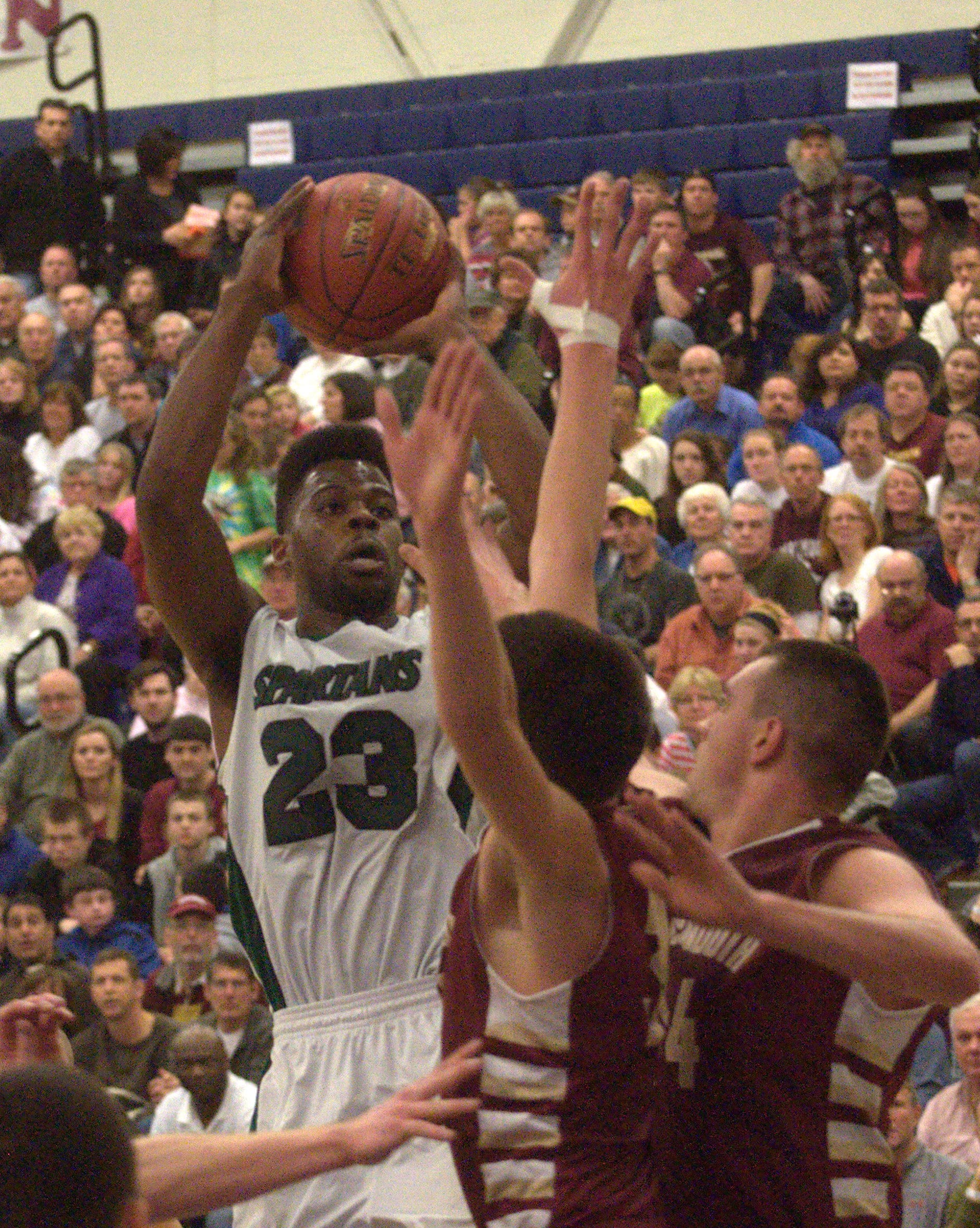 Pembroke's Kafani Williams pulls up for a jump shot during Saturday's game.