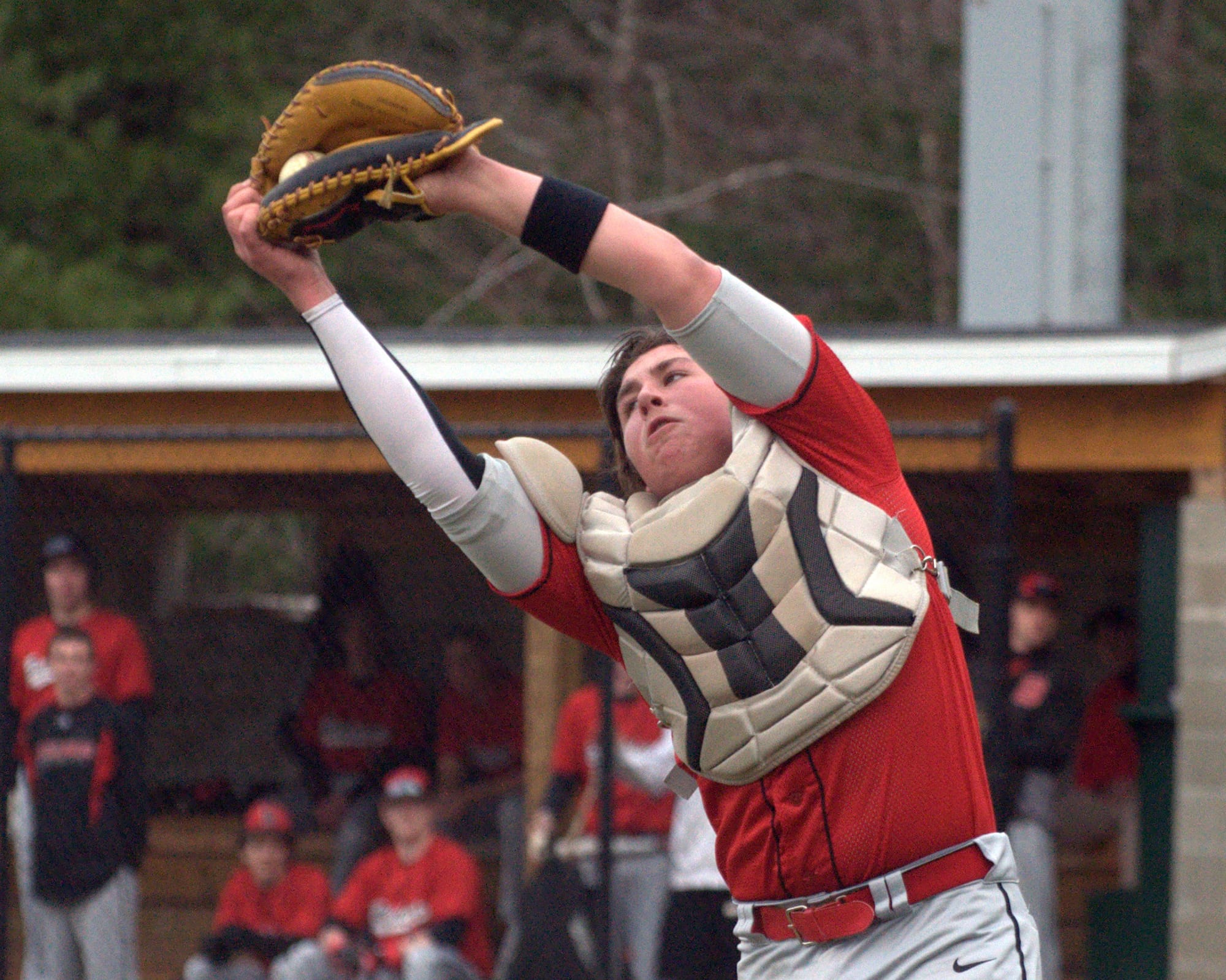 Bedford's Brendan Kelliher catches a popup during Friday's game.