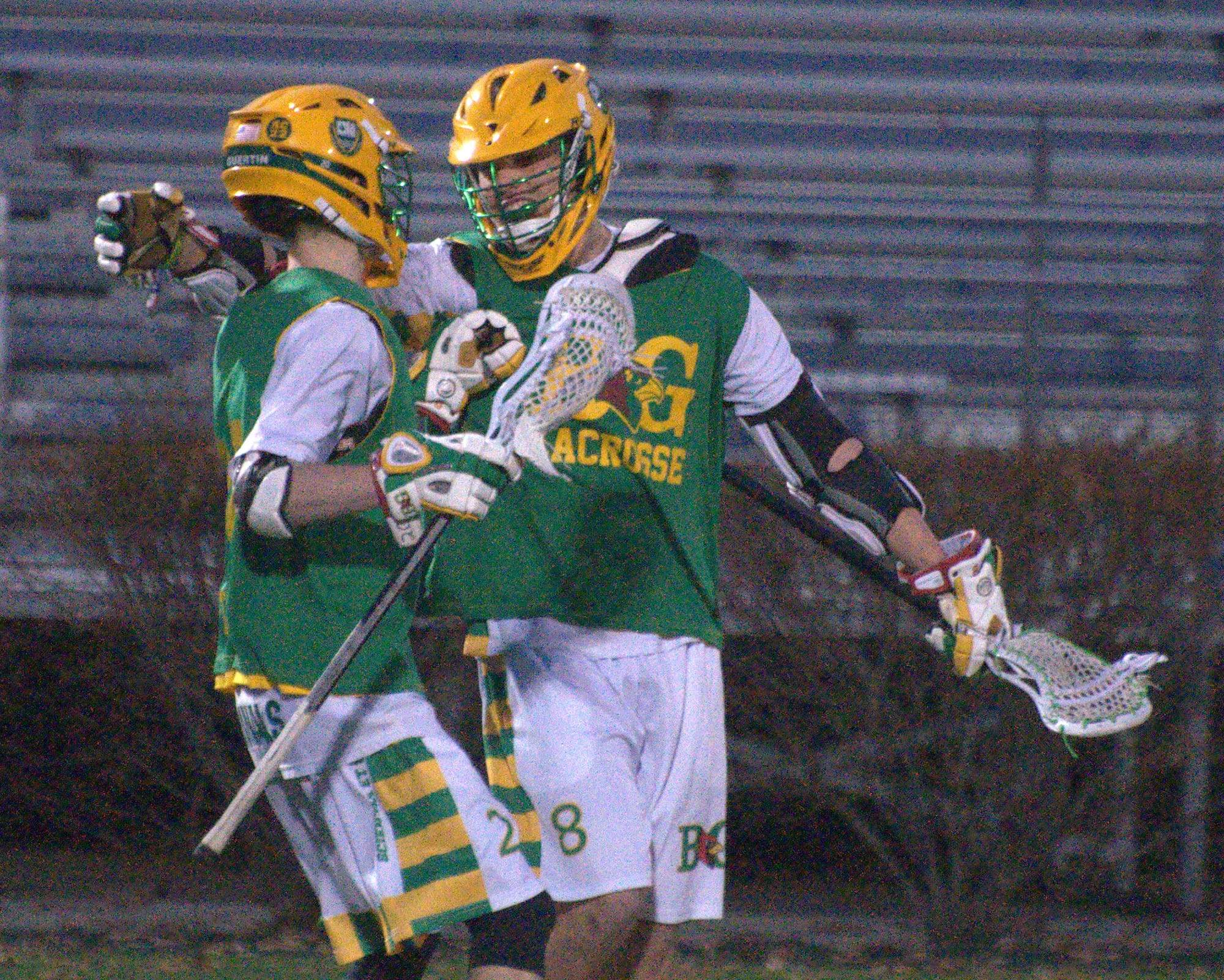 Bishop Guertin players react after scoring a goal during Wednesday's scrimmage with Bedford.