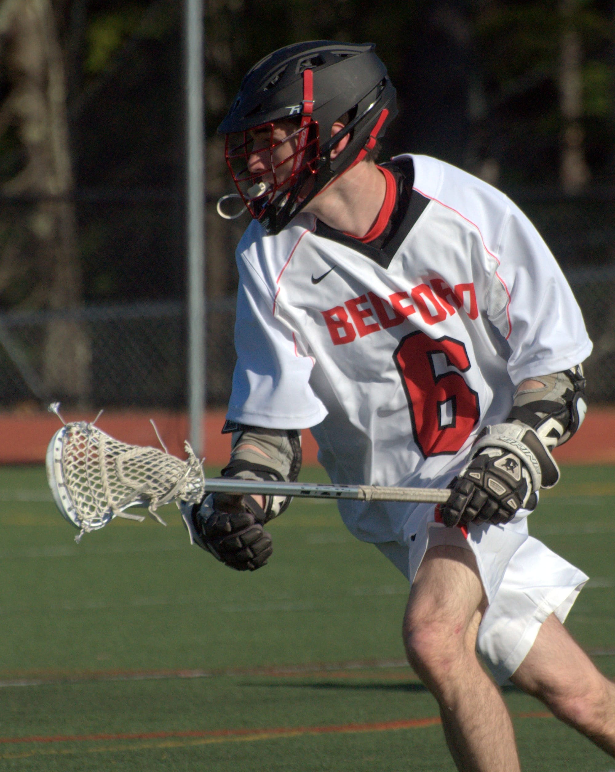 Bedford's Dan Colella looks for a hole in the Merrimack defense.