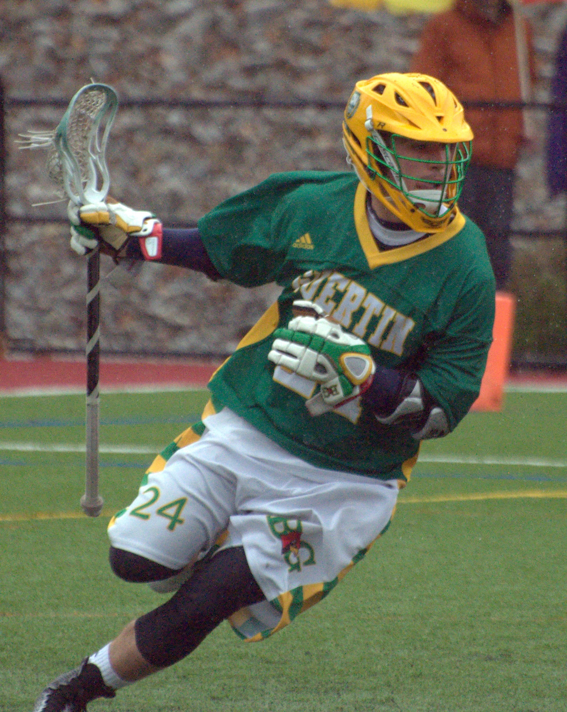 Bishop Guertin's Connor Donahue looks for room to operate behind the goal.