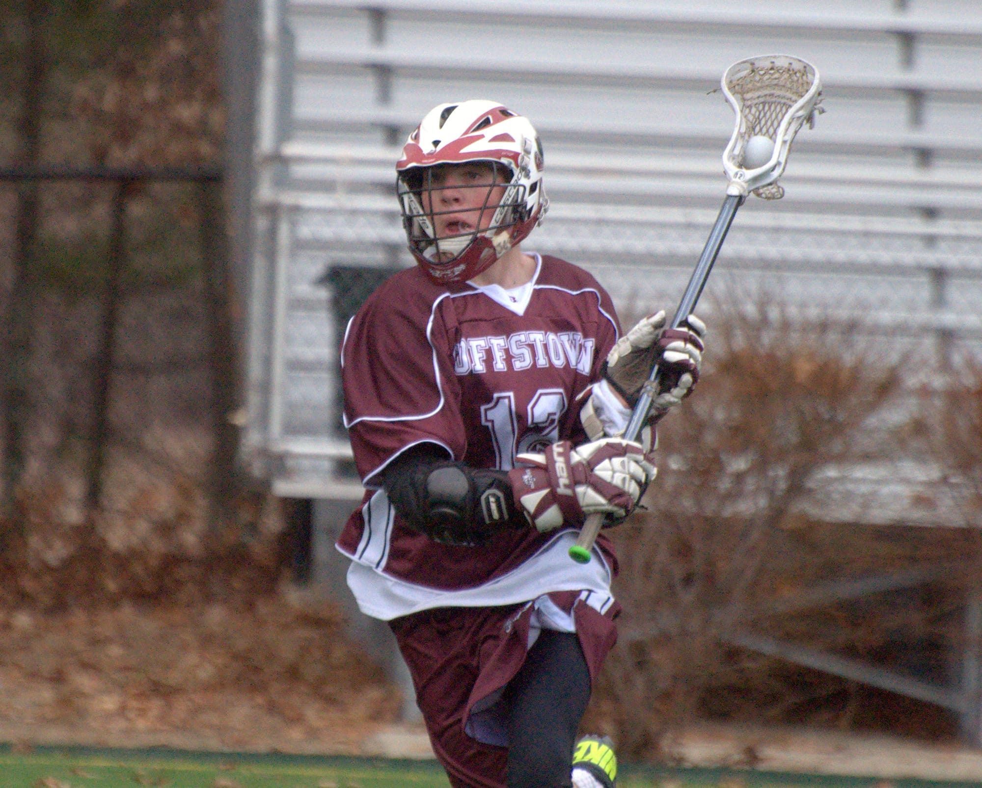 Goffstown's Jack Carney runs with the ball during Saturday's scrimmage against Bishop Guertin.