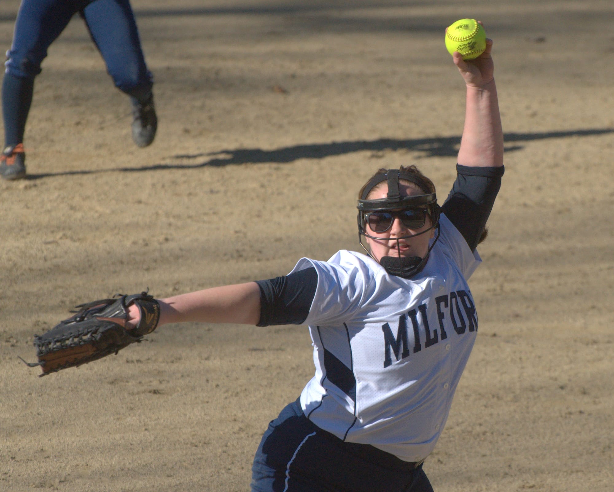 Milford's Kaitlyn Nelson delivers a pitch.