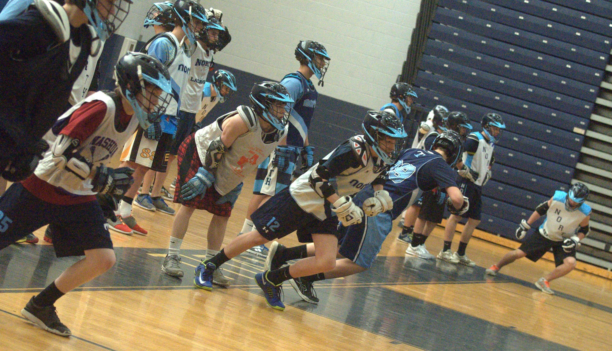 Nashua North players run sprints during practice earlier this week.