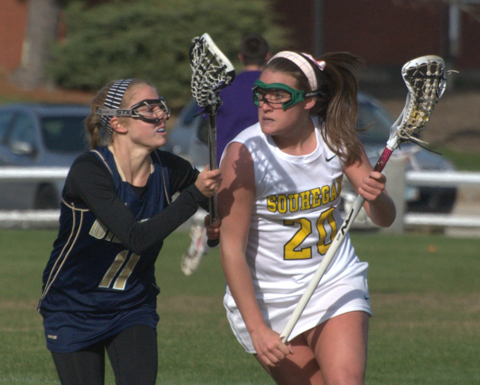 Souhegan's Mickenzie Larivee tries to get by Windham's Alexandra Lewis during Thursday's game.
