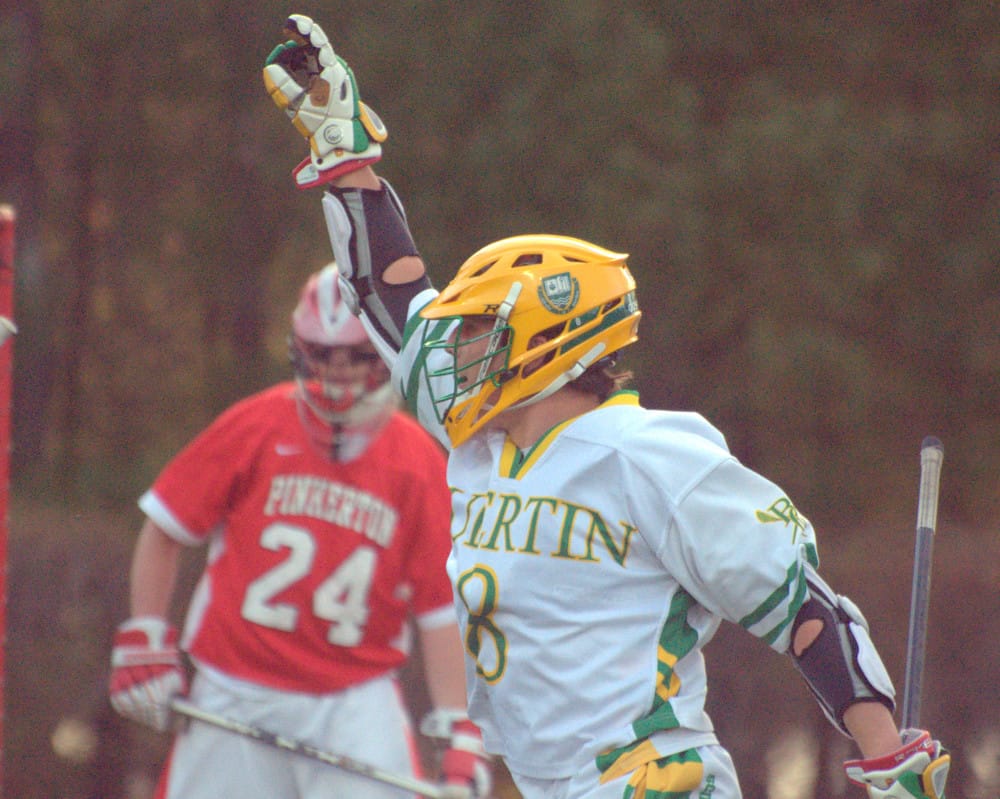Bishop Guertin's Tom Hurley celebrates after scoring a goal Monday against Pinkerton.