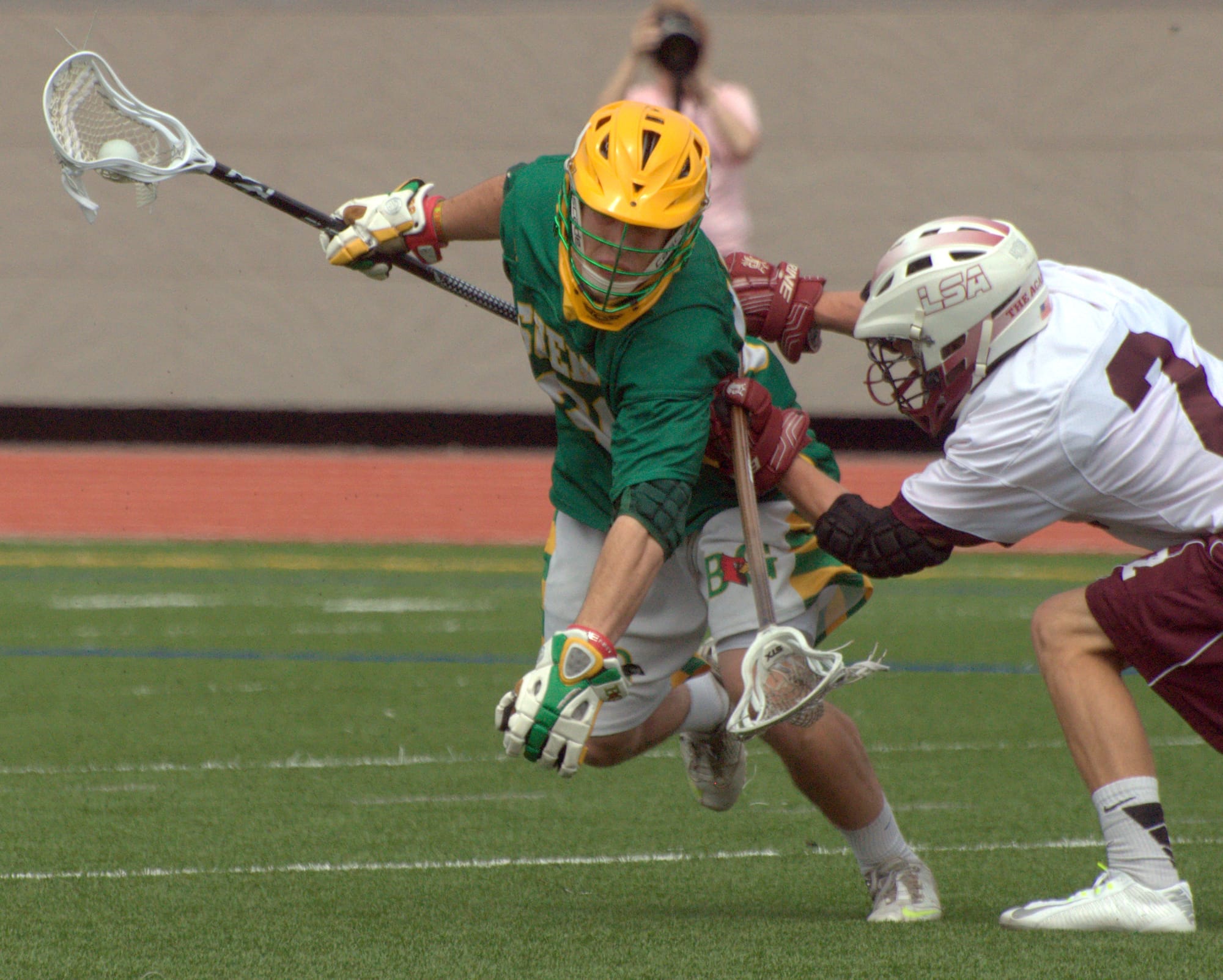 Bishop Guertin's Dom St. Laurent tries to fight off La Salle's Matt Fox during Saturday's game.