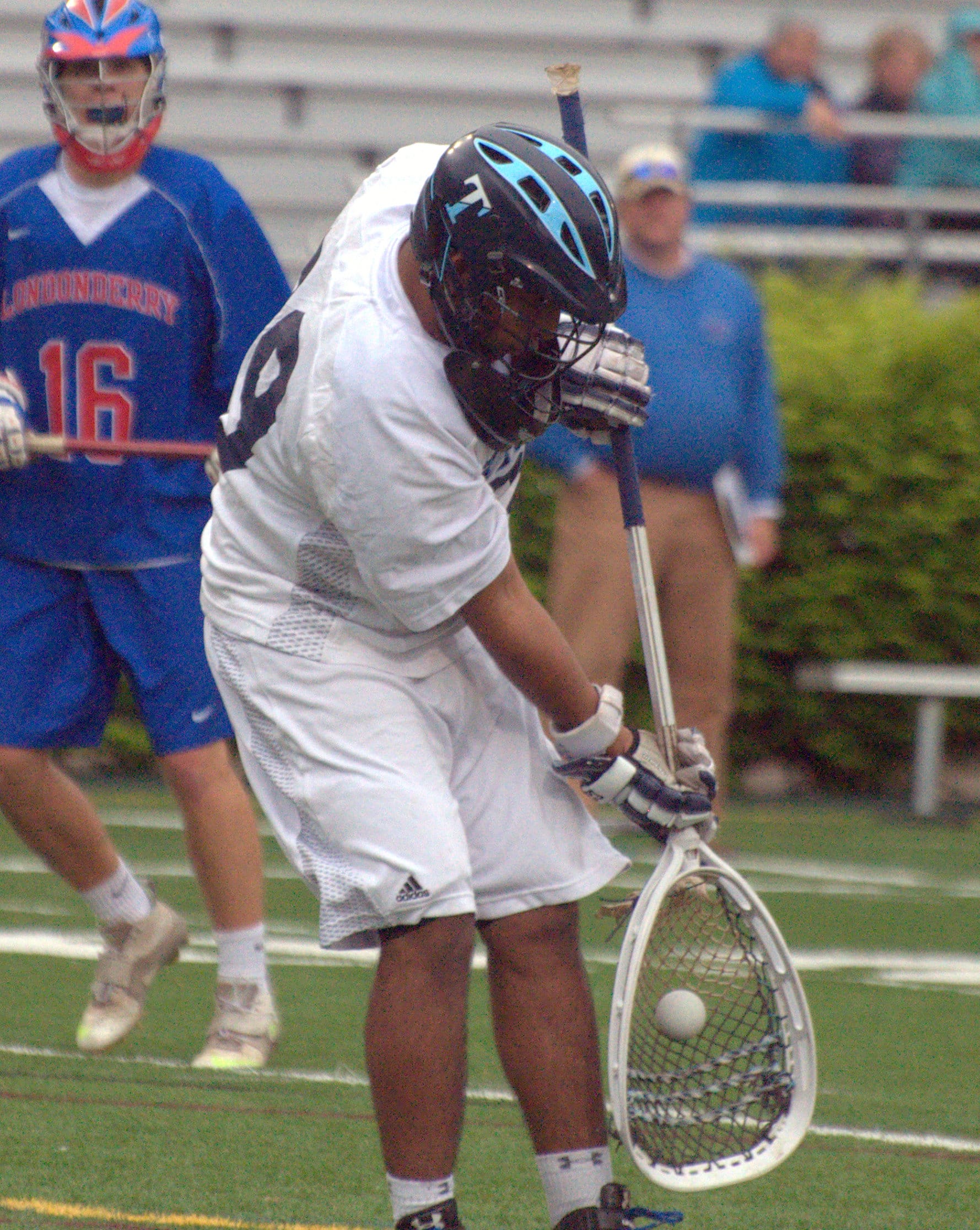 Nashua North's Hanzla Sheikh makes a save.
