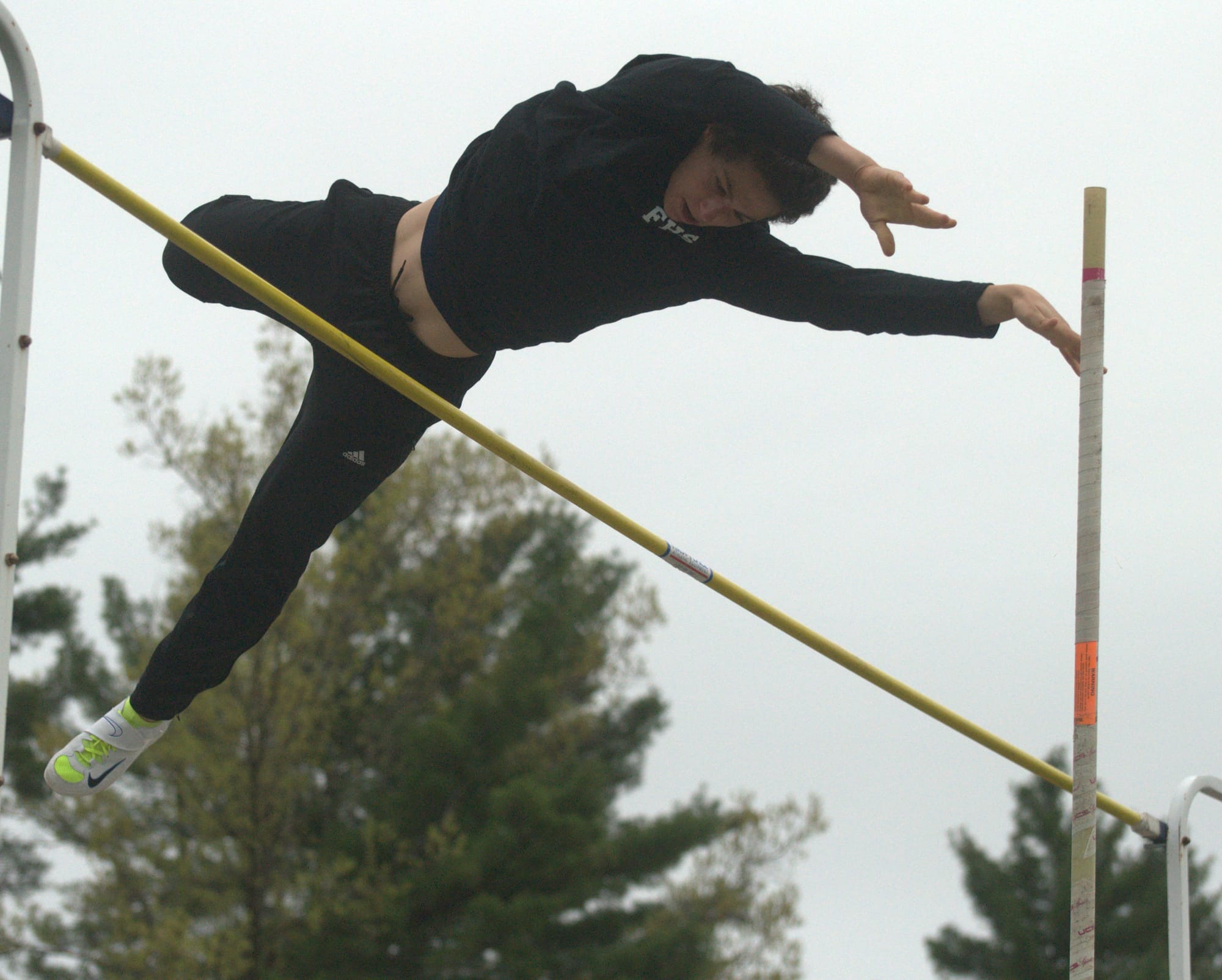 Nashua North's Morley Kert clears the bar during the pole vault at a dual meet Tuesday.