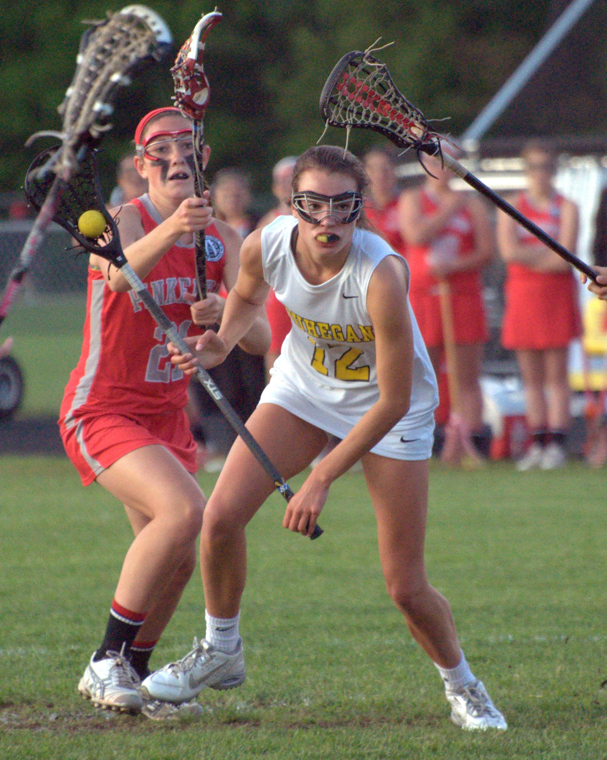 Souhegan's Jocelyn Donohue makes her way through the Pinkerton defense during Thursday's game.