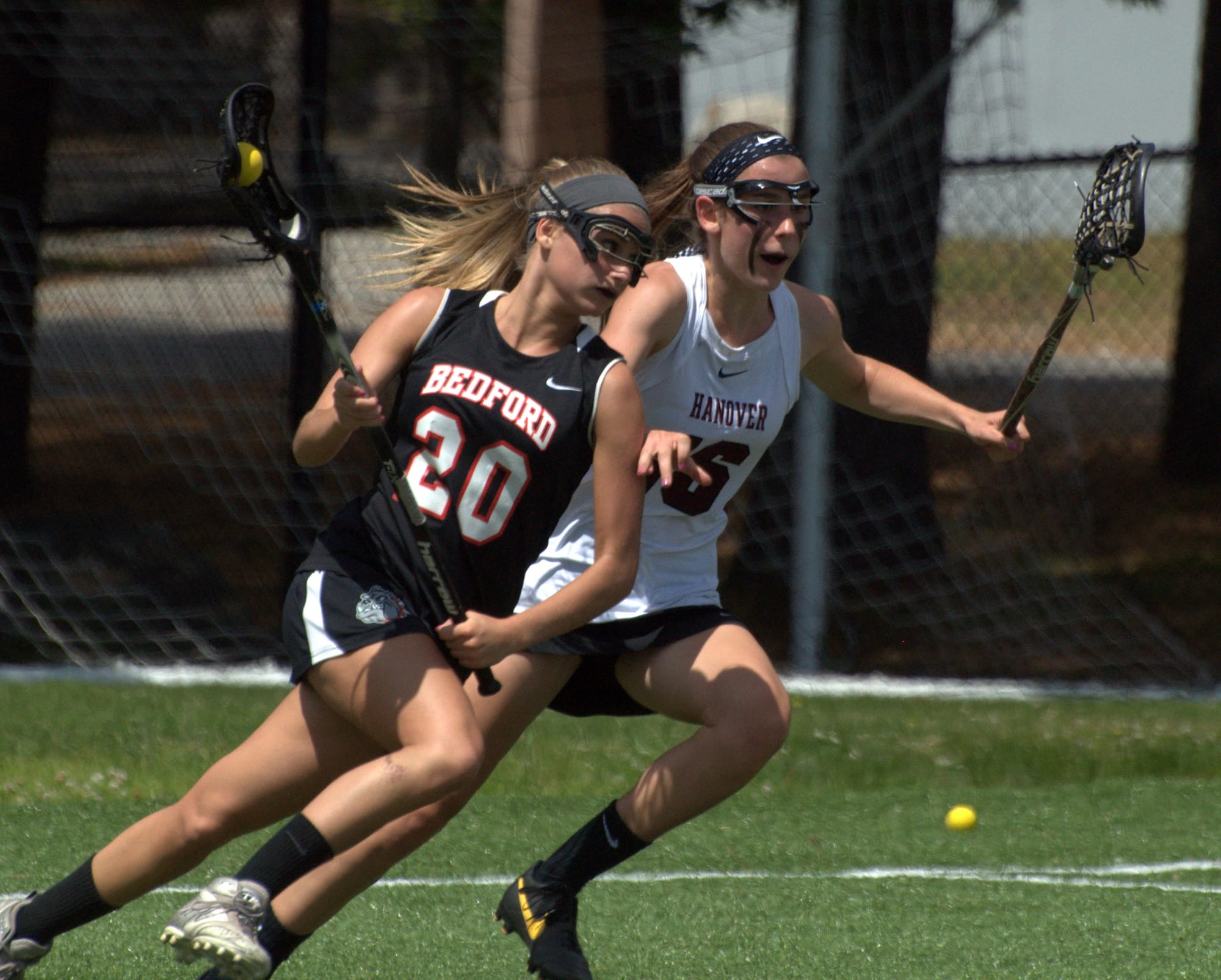 Bedford's Drew Shapiro tries to run past Hanover's Madeline Lyons during Saturday's Division II semifinal.