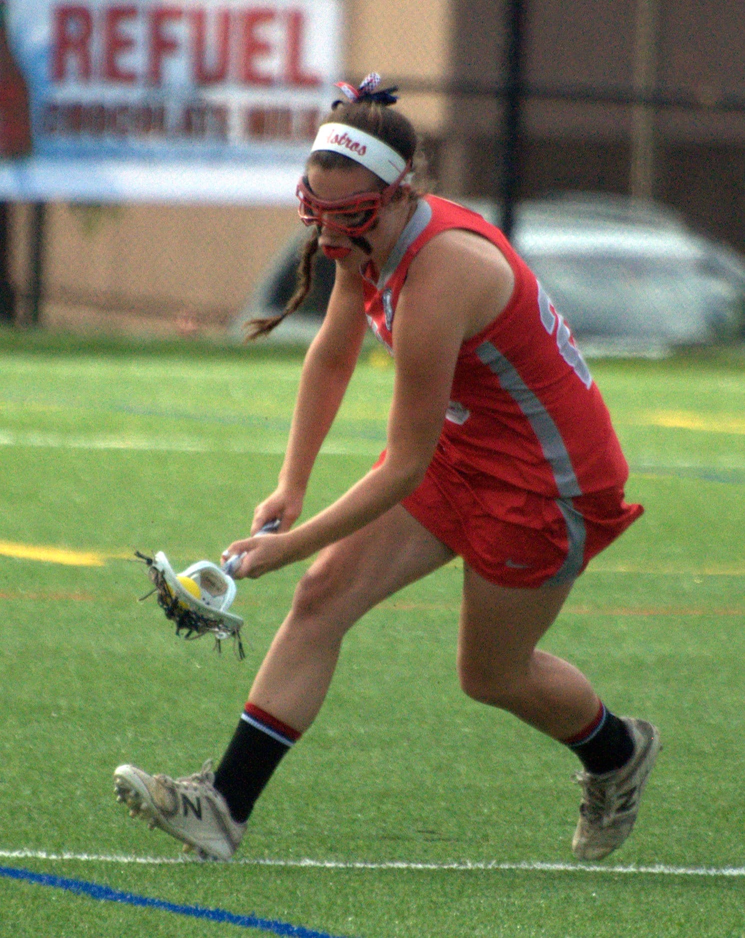 Pinkerton's Kennedy Daziel scoops up a groundball.