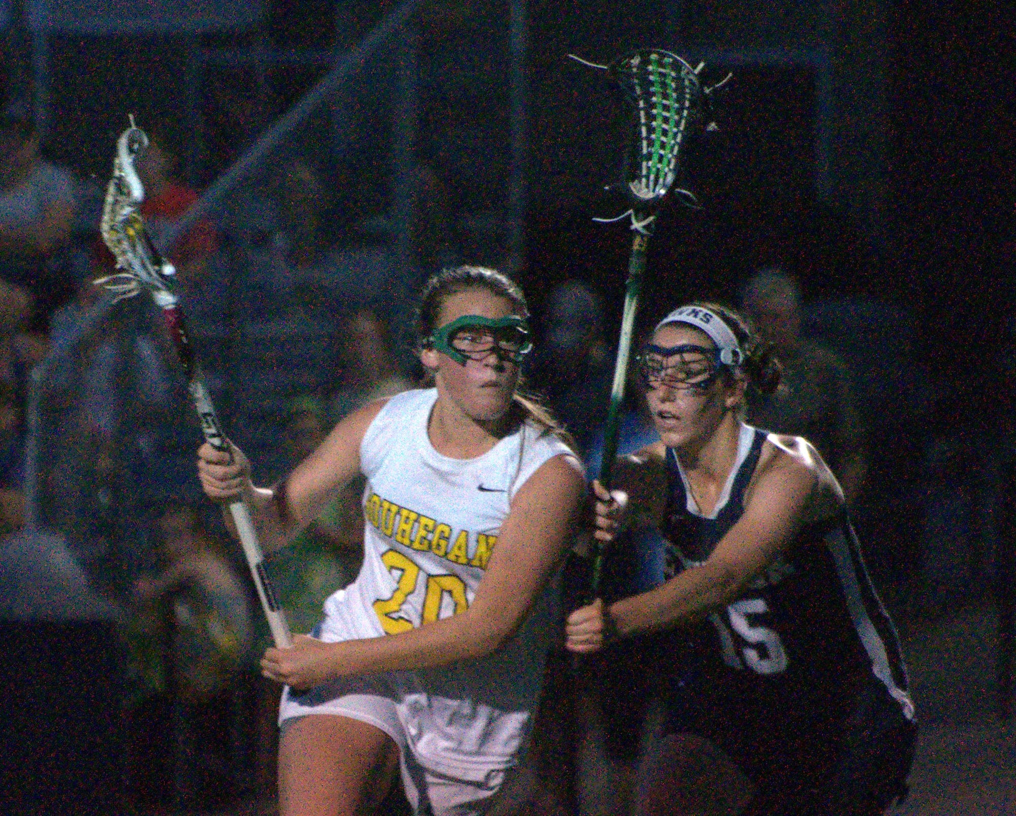 Souhegan's Mickenzie Larivee tries to get by Exeter's Kristina Keith during Saturday's semifinal.