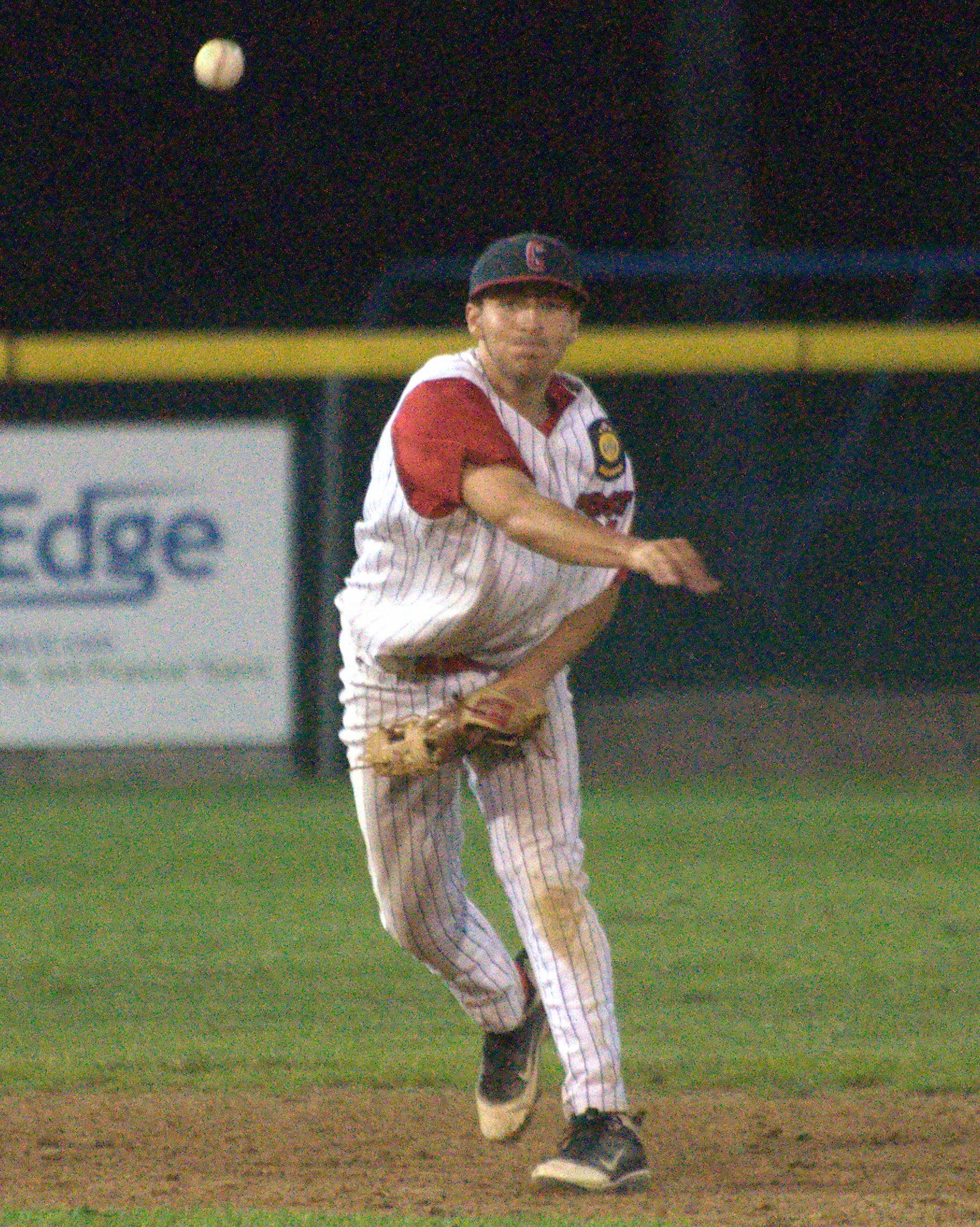 Concord's Brad Murphy makes a throw to first.