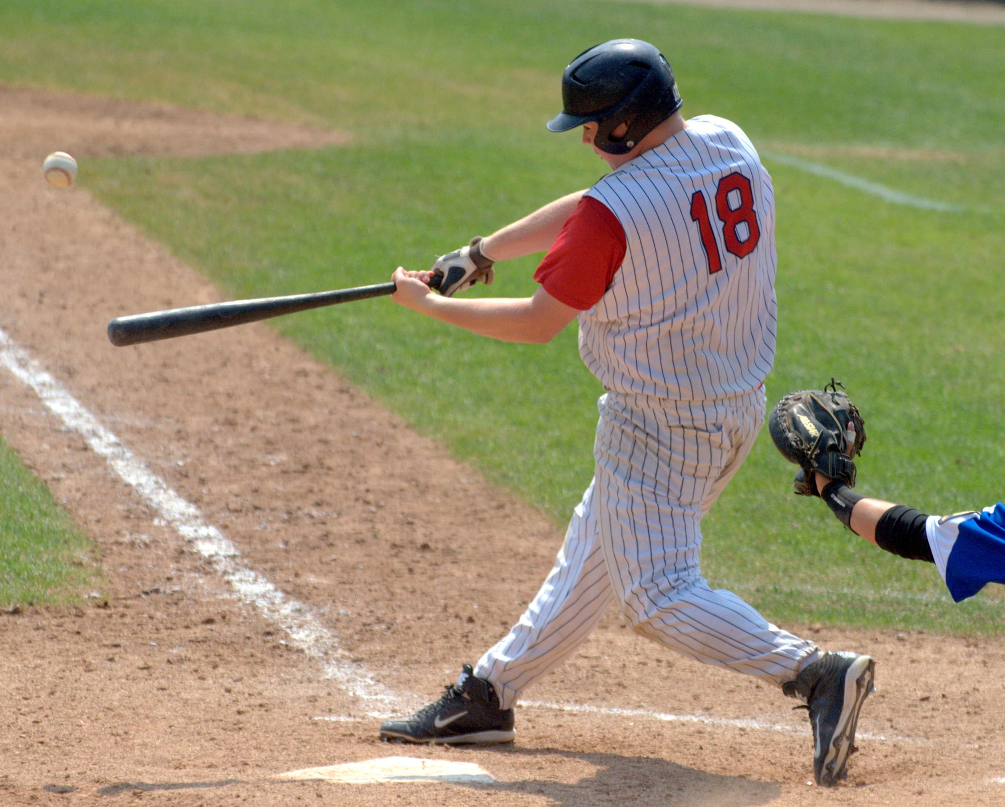 Concord's Chris Gauss connects during the ninth inning.