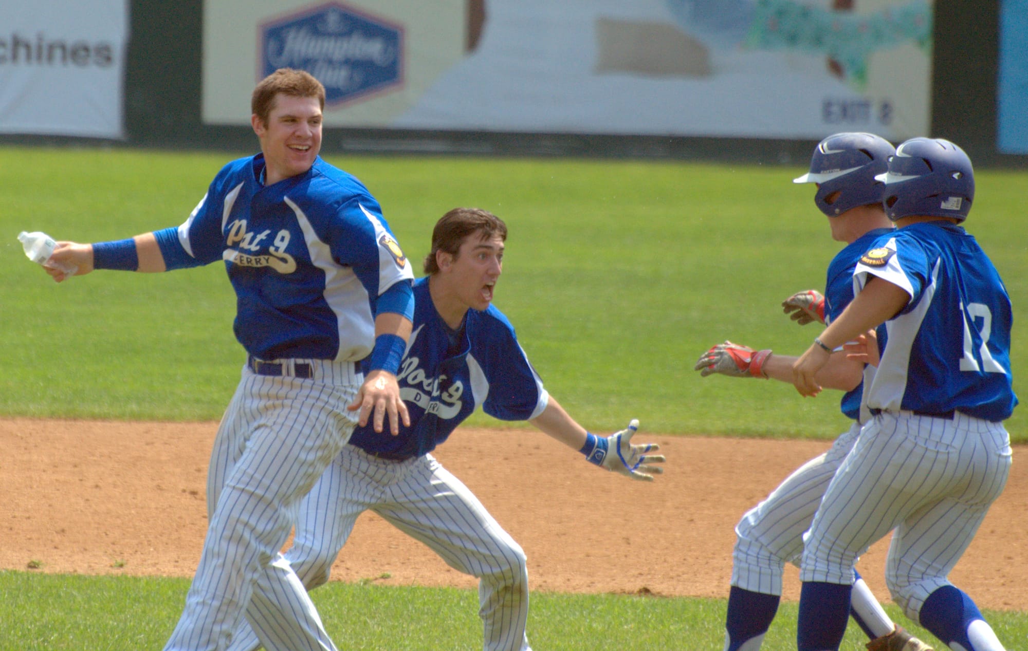Derry players celebrate after Pat Mahoney (center) hit a walkoff single to beat Concord on Friday.