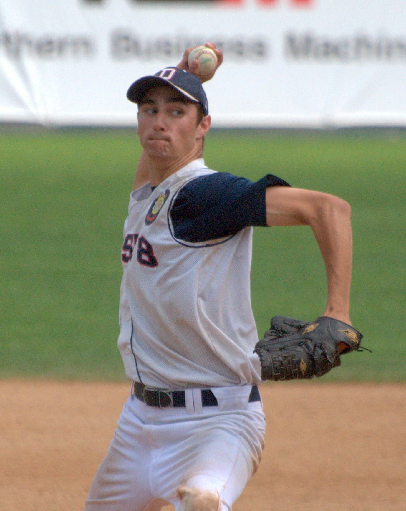 Dover's Aaron Denis pitches during Tuesday's championship game.