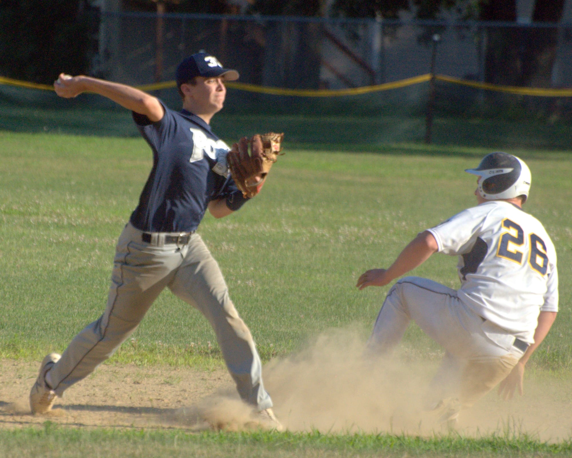 Exeter's Colin Graham tries to complete a double play.