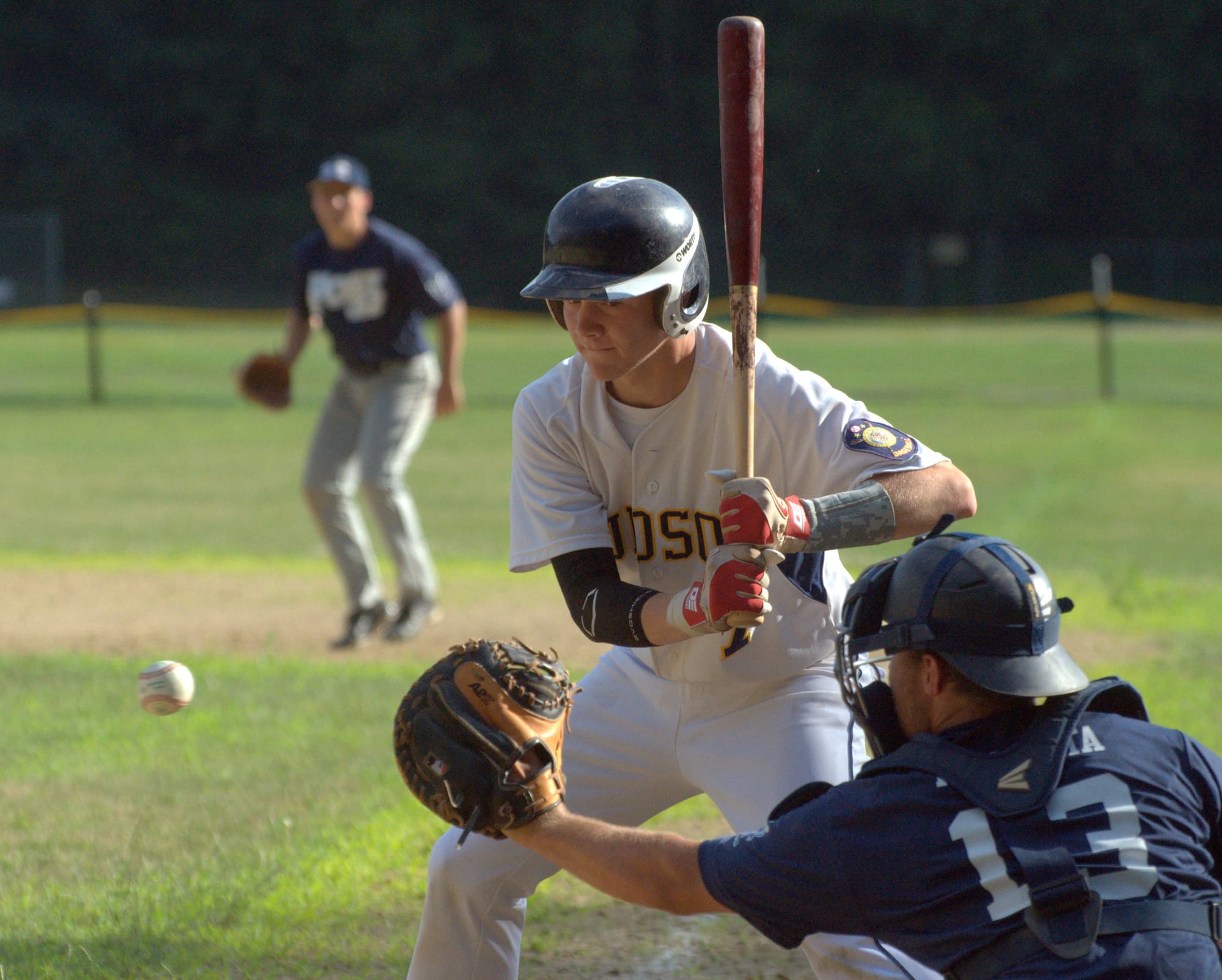 Hudson's Dan Brown takes a pitch during Friday's game against Exeter.
